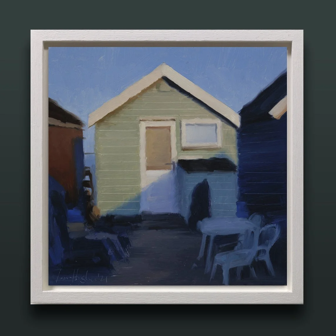 Green hut with table and chairs framed.jpg