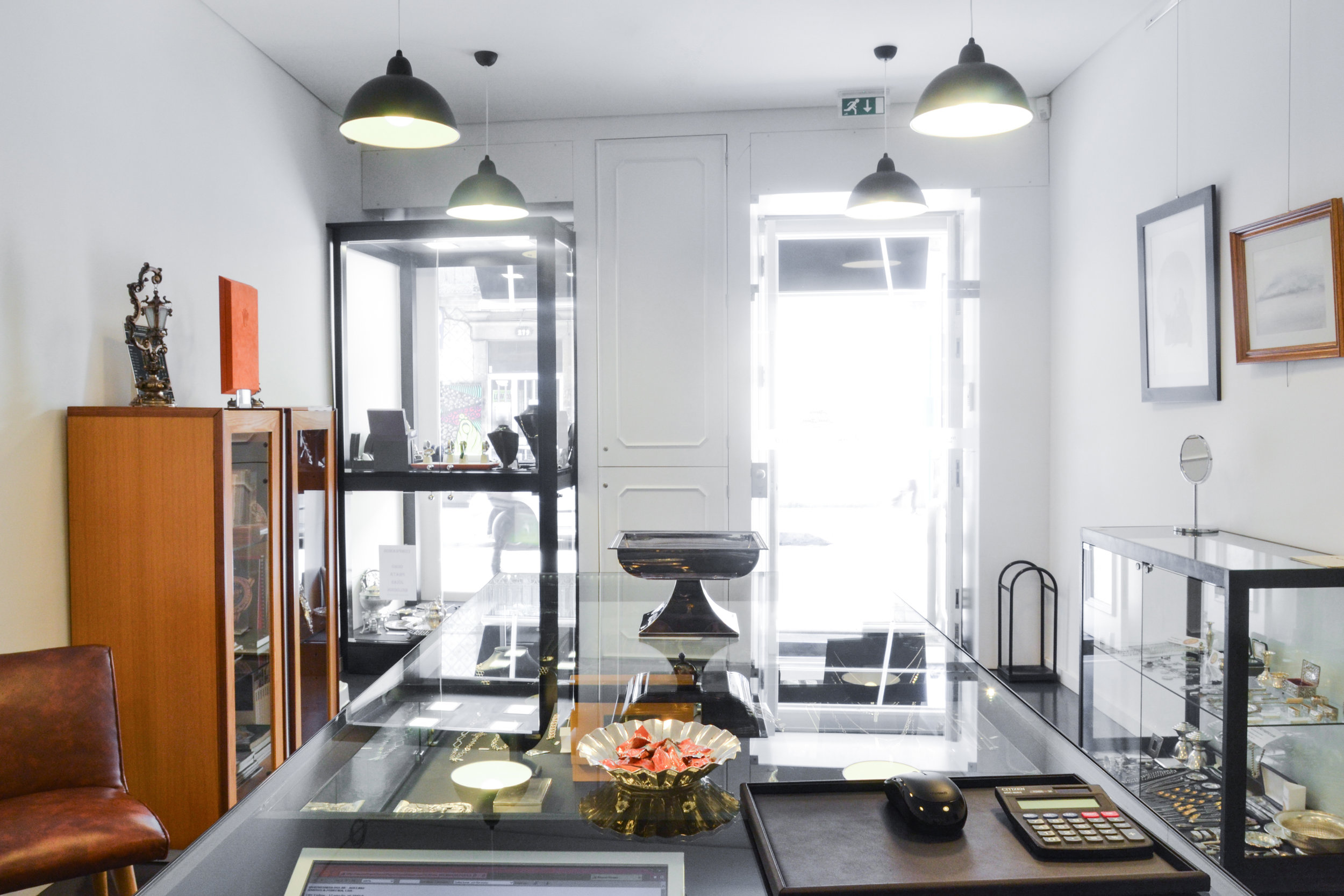 In order to maintain the particular nature of the former pharmacy it was used the same scheme at the back office and at the front office . The existing furniture was modernized and adapted to the requirements of the new store, including the divider between the two areas of the store.