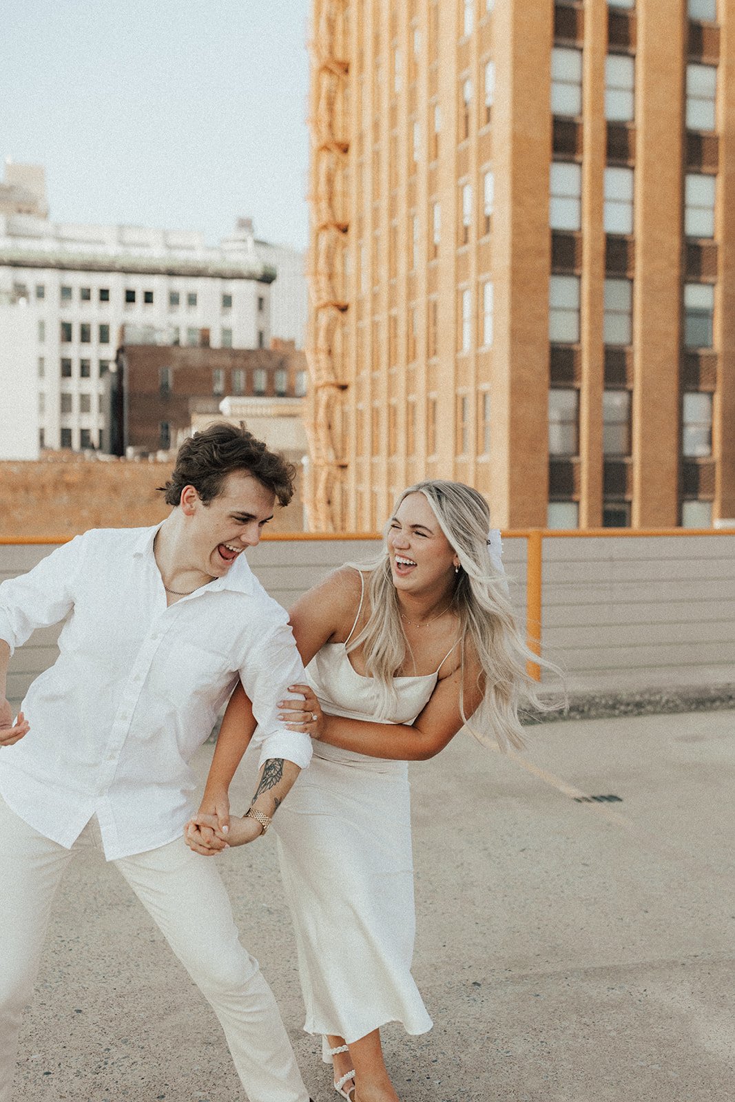 hannah-and-trey-parking-can-be-fun-downtown-memphis-river-walk-mississippi-beach-tennessee-wedding-photographer-jo-darling-photography-102.jpg