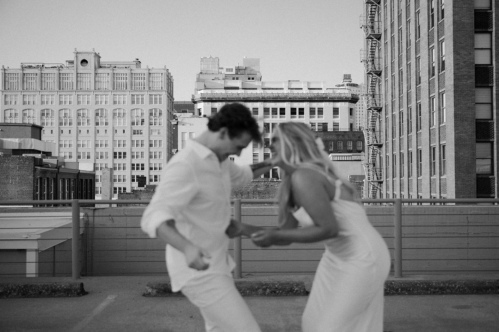 hannah-and-trey-parking-can-be-fun-downtown-memphis-river-walk-mississippi-beach-tennessee-wedding-photographer-jo-darling-photography-109.jpg