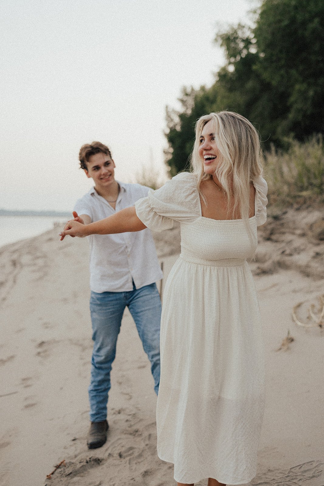 hannah-and-trey-parking-can-be-fun-downtown-memphis-river-walk-mississippi-beach-tennessee-wedding-photographer-jo-darling-photography-227.jpg