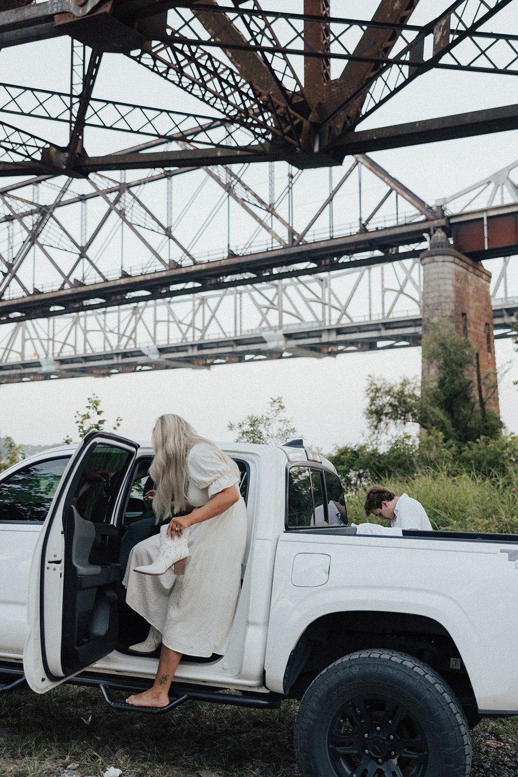 hannah-and-trey-parking-can-be-fun-downtown-memphis-river-walk-mississippi-beach-tennessee-wedding-photographer-jo-darling-photography-192.jpg