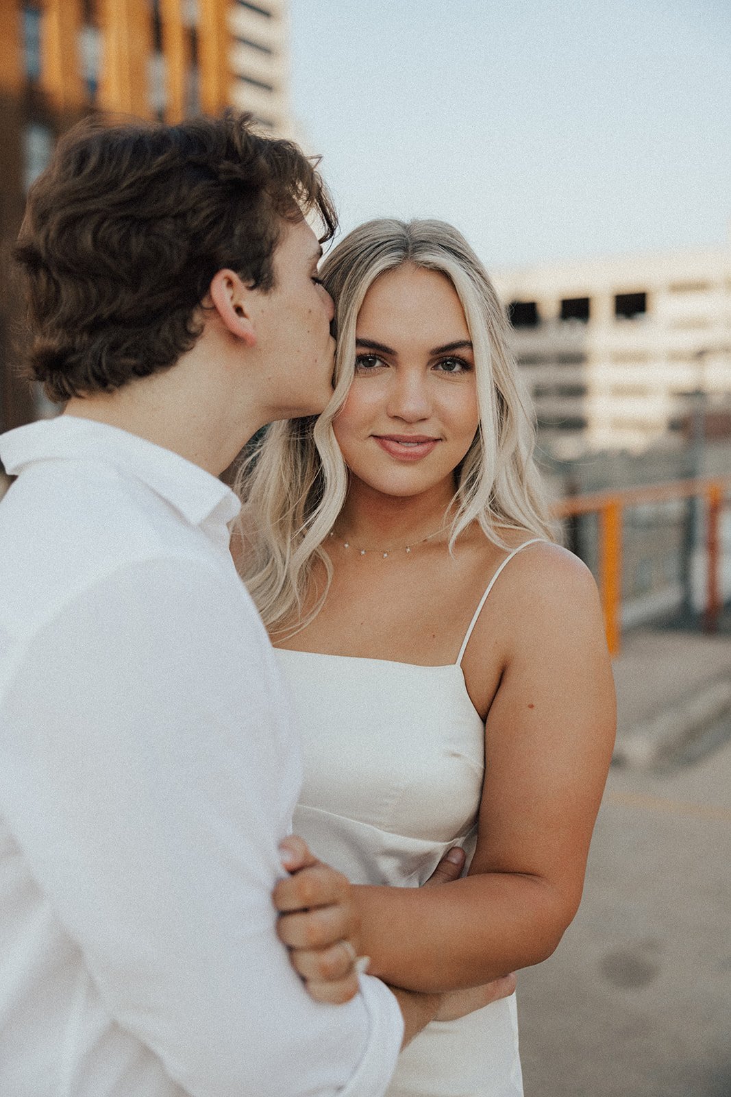 hannah-and-trey-parking-can-be-fun-downtown-memphis-river-walk-mississippi-beach-tennessee-wedding-photographer-jo-darling-photography-69.jpg