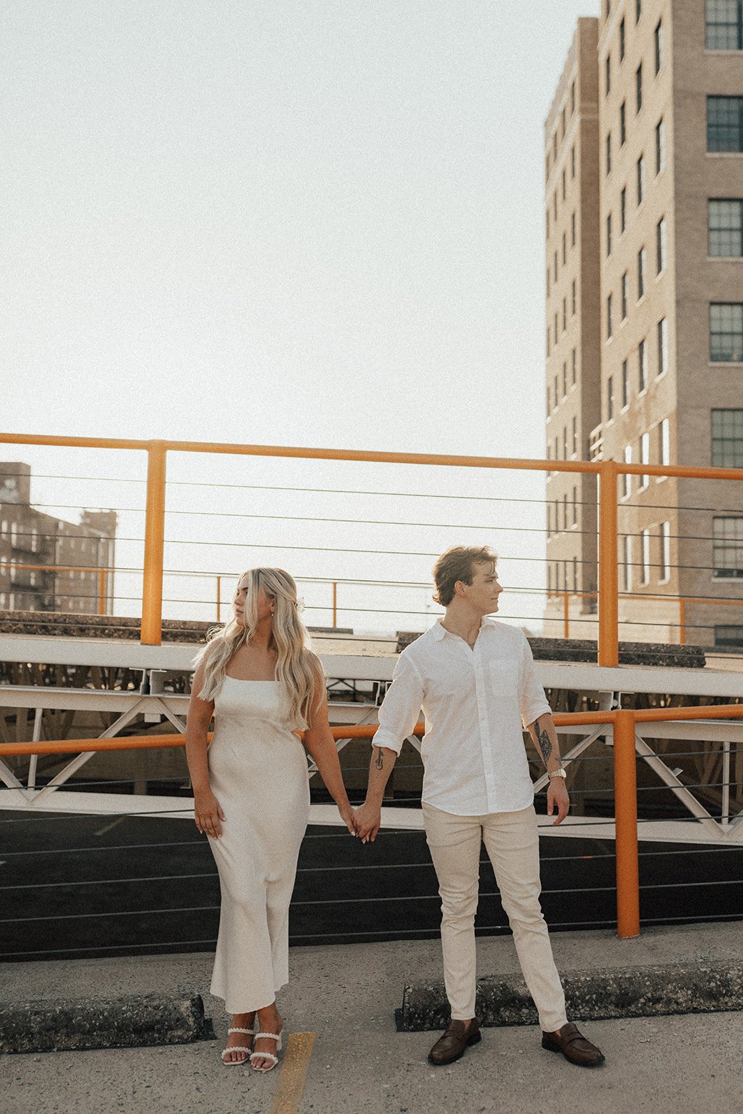 hannah-and-trey-parking-can-be-fun-downtown-memphis-river-walk-mississippi-beach-tennessee-wedding-photographer-jo-darling-photography-182.jpg