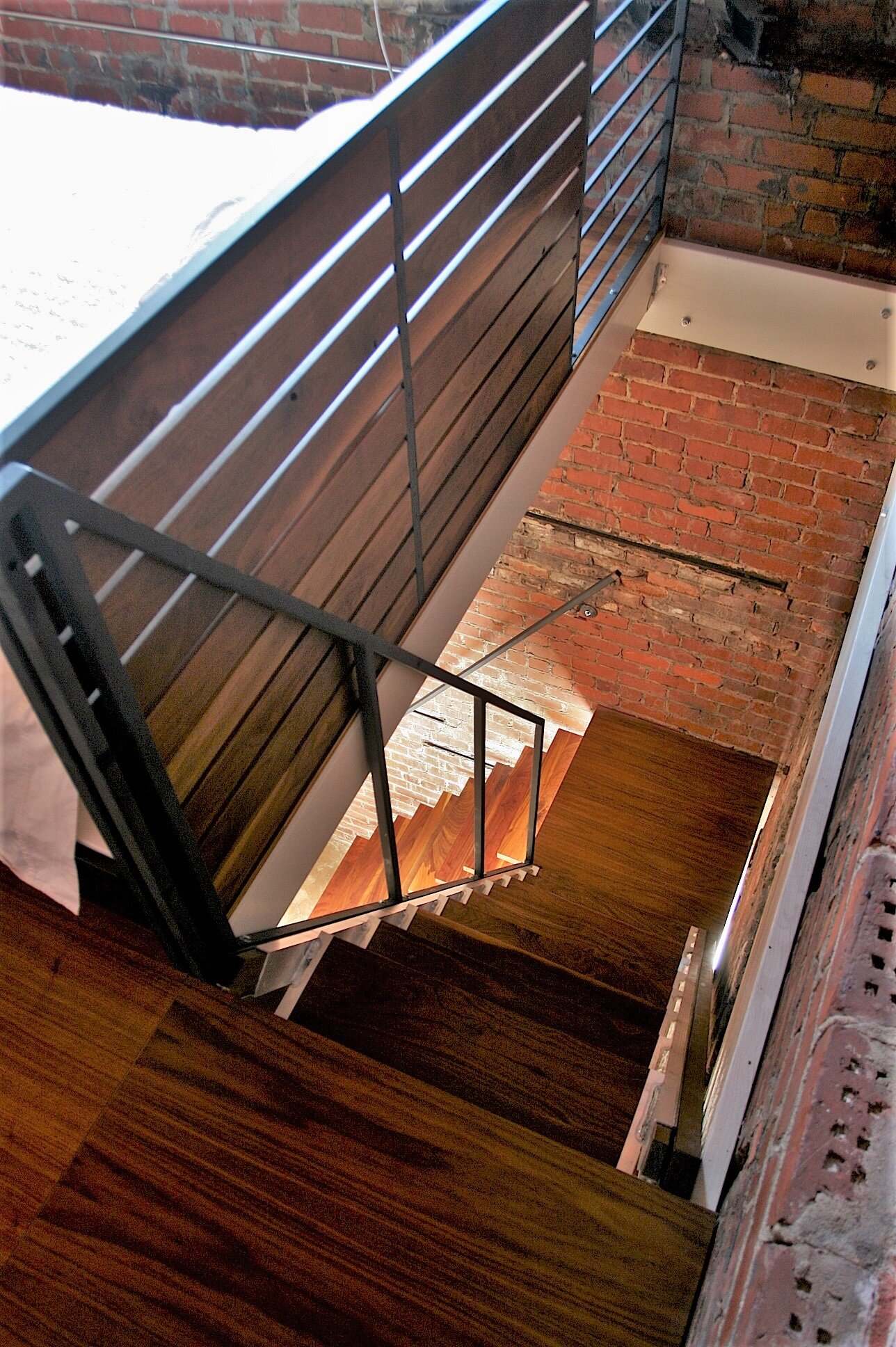 back of railing wintegrated headboard and staircases 1.jpg