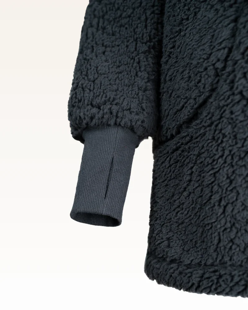 black sherpa sleeve.webp