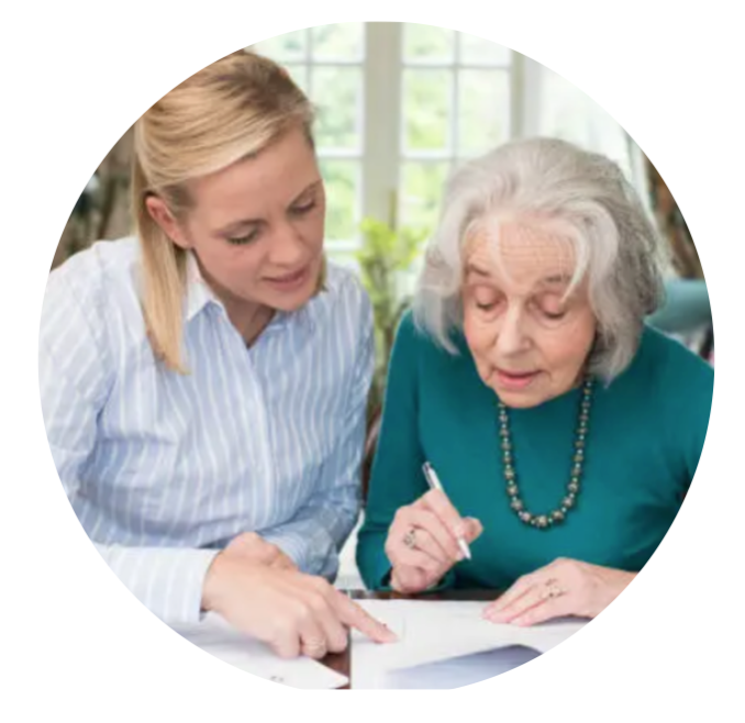 2 women looking at paperwork