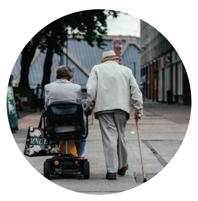 two elderly people pictured from behind