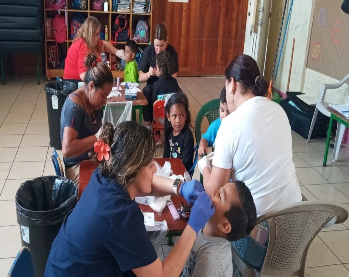 Fluoride application during Dr. Michelle Henshaw's visit