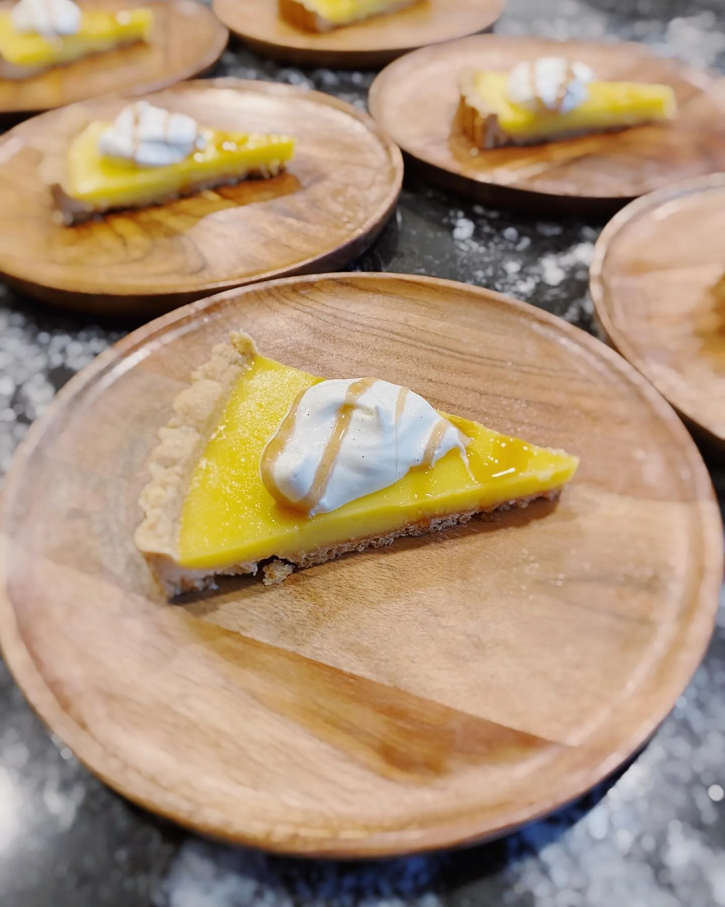 The perfect ending to a summer evening, a lemon curd tart with shortbread crust, fresh vanilla bean vanilla bean whipped cream with lavender honey drizzle 🍋🍯