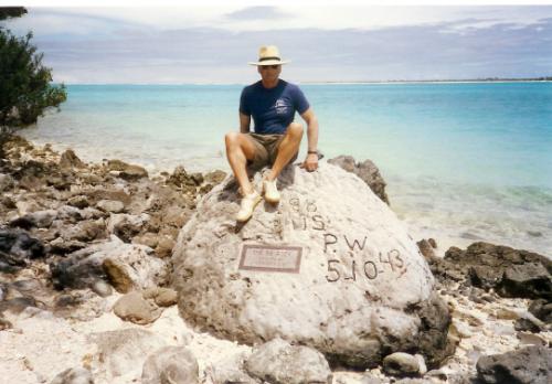Sig Eichberg on top of the rock that honors the 98 POWs that were killed by the Japanese..jpg