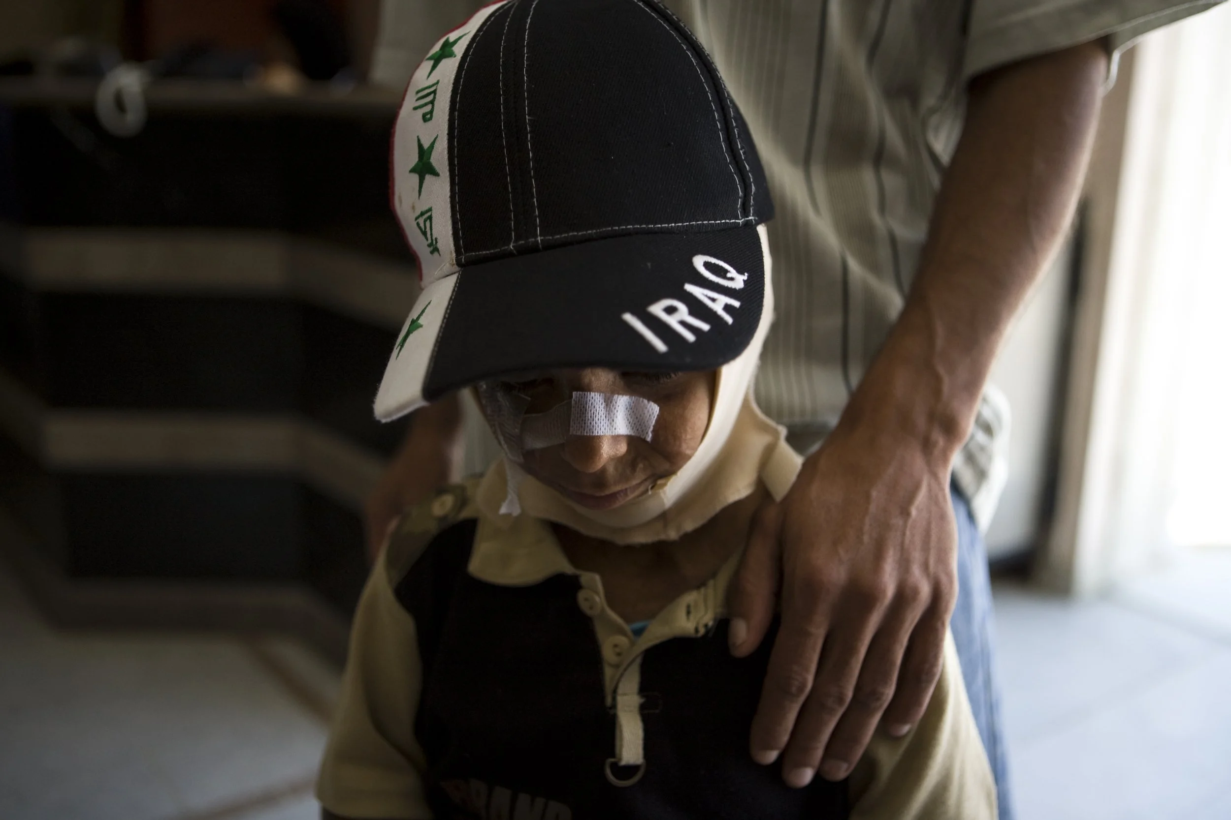 Young Iraqi girl and father