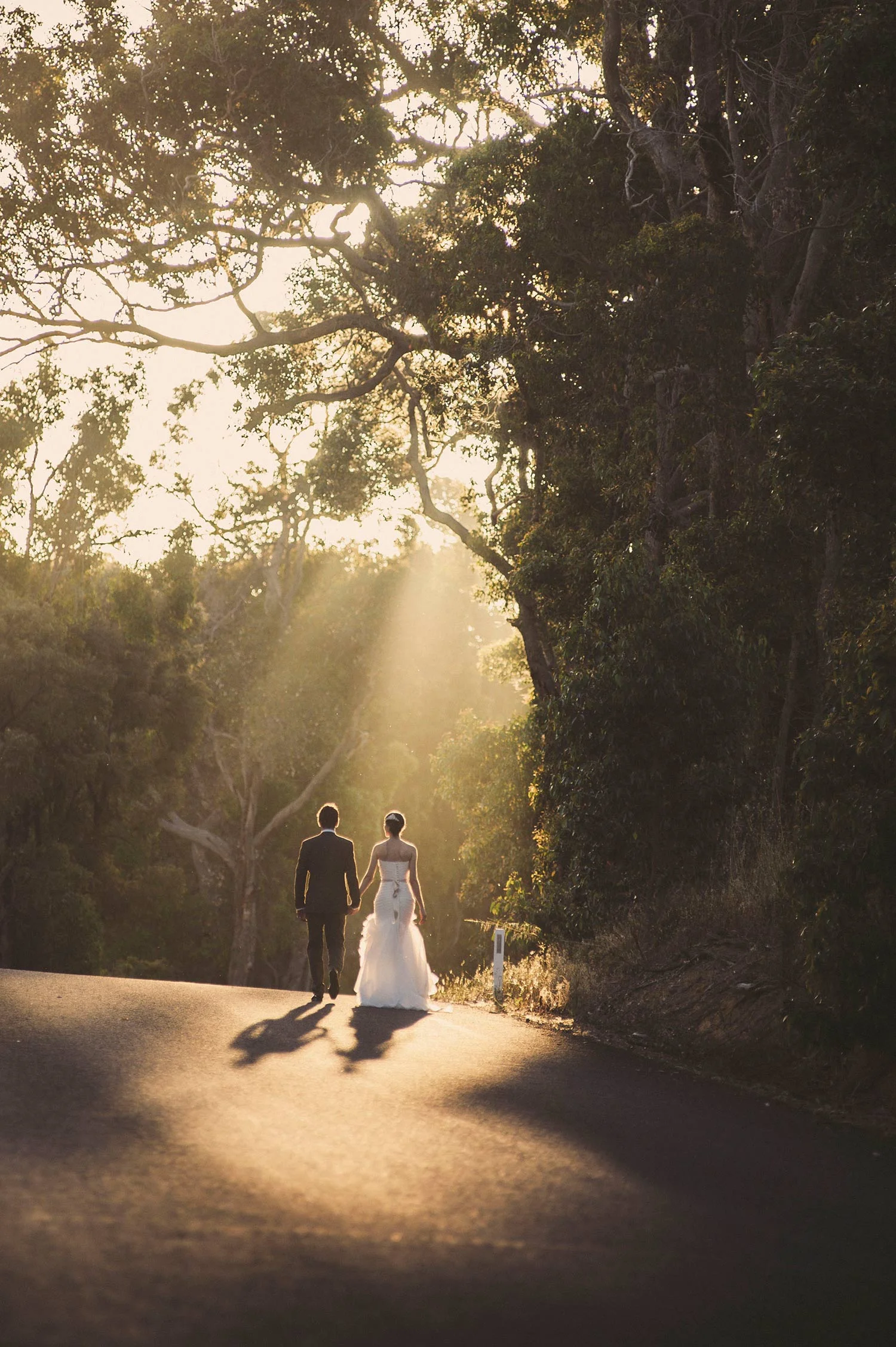 Bride and groom in the sunlight at Chandeliers On Abbey - Leigh and Janelle.jpg