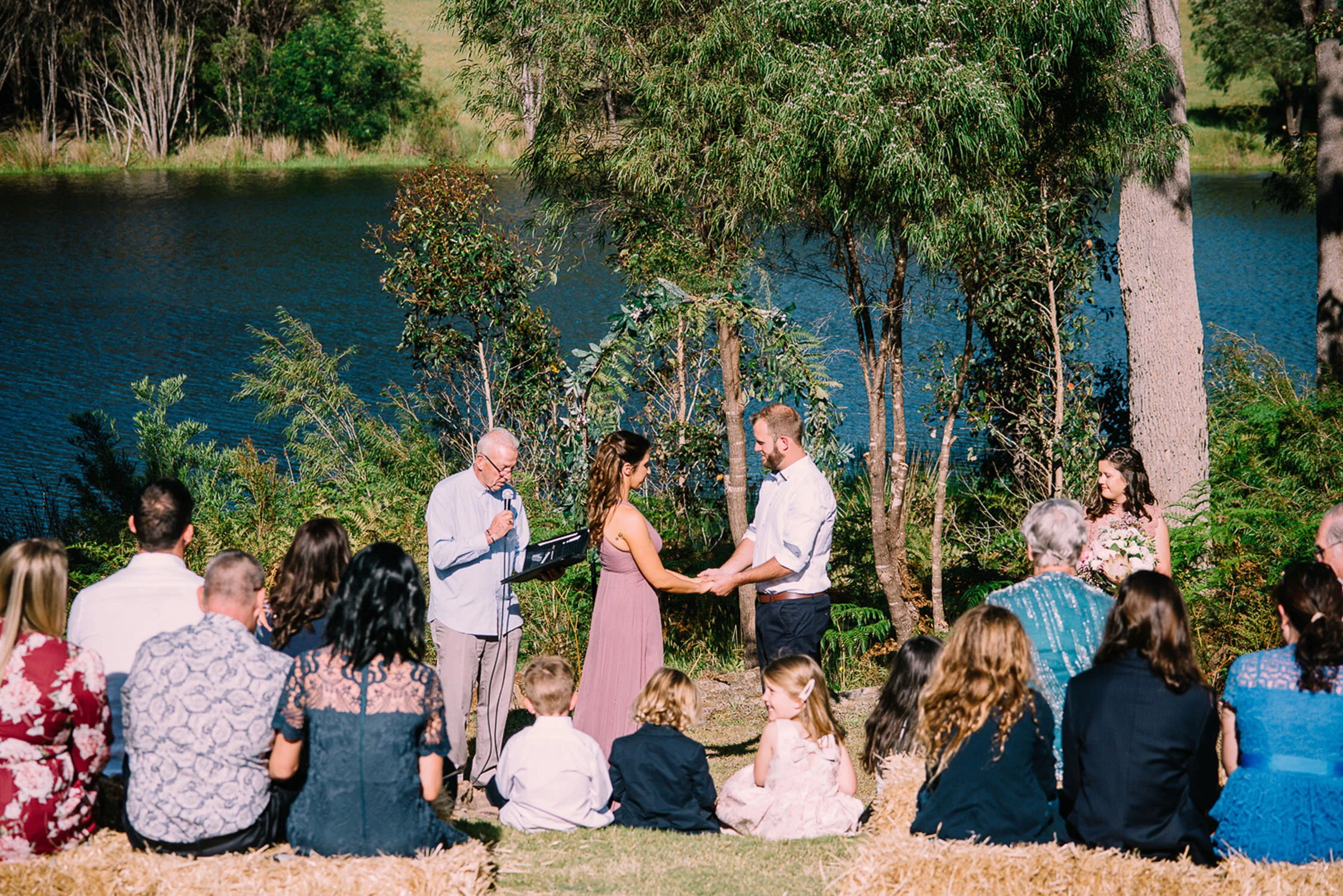 Elopement wedding ceremony overlooking Harmony Lake at Harmony Forest