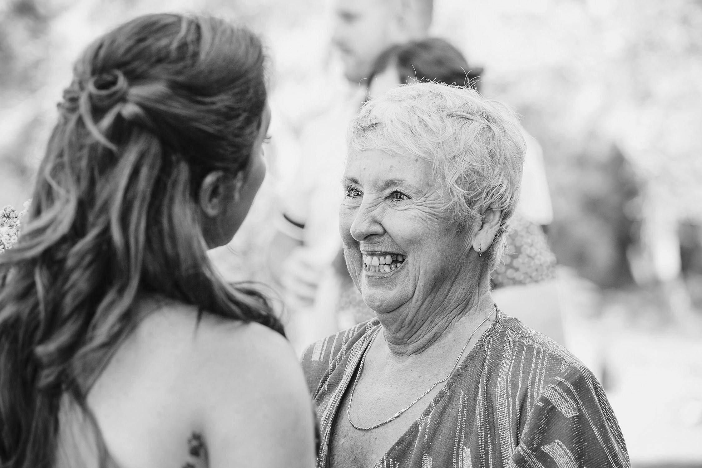 mother of bride excitedly congratulates her daughter.jpg
