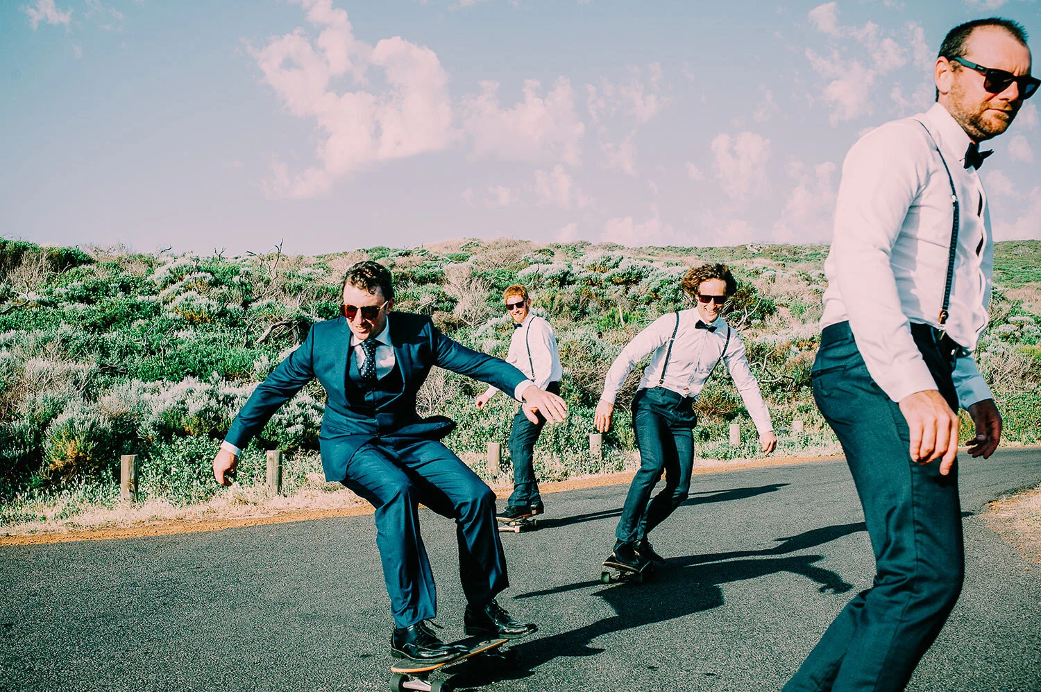 groomsmen skateboarding together at wedding in Margaret River