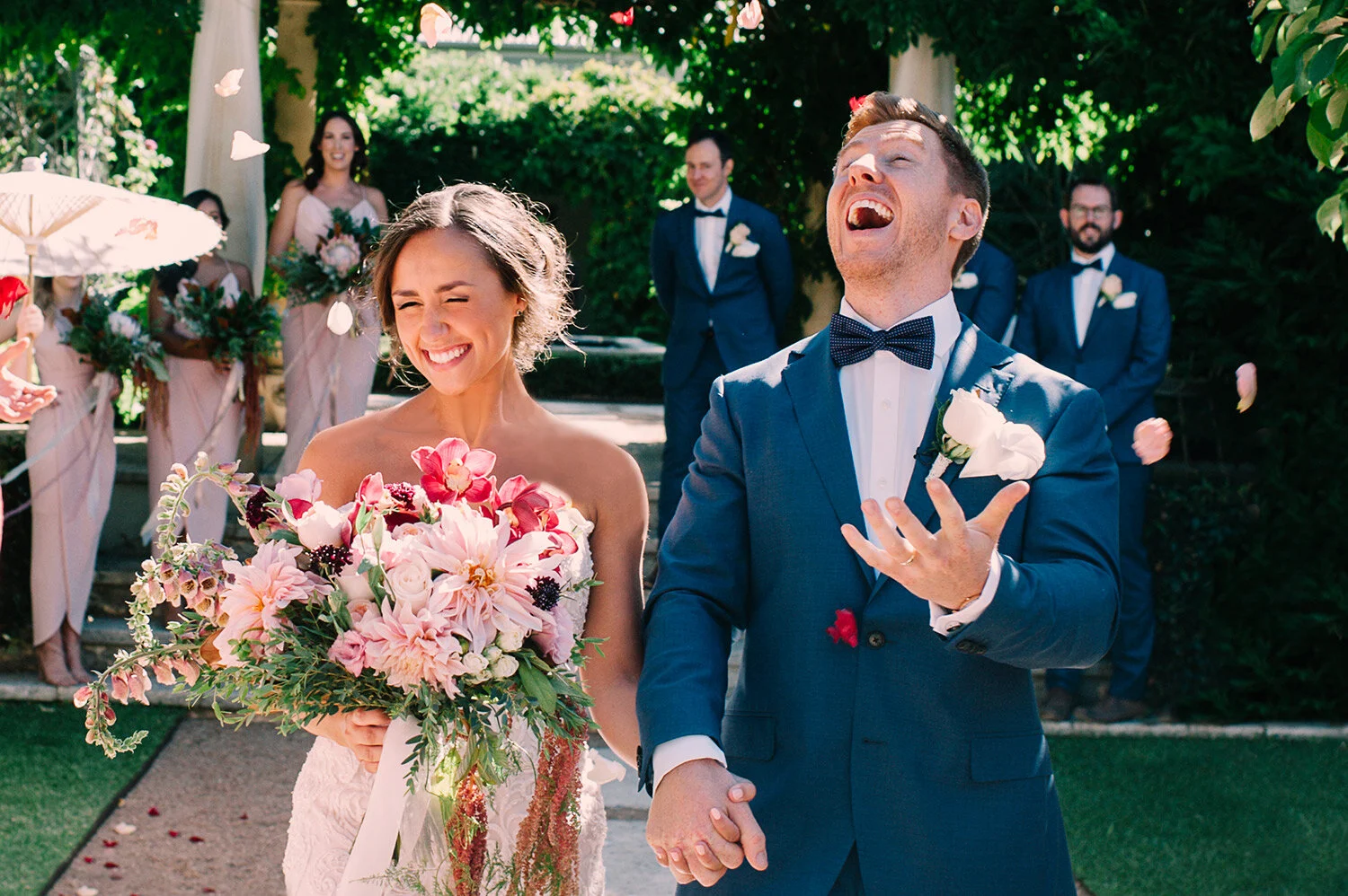 bride and groom excitedly celebrating their marriage