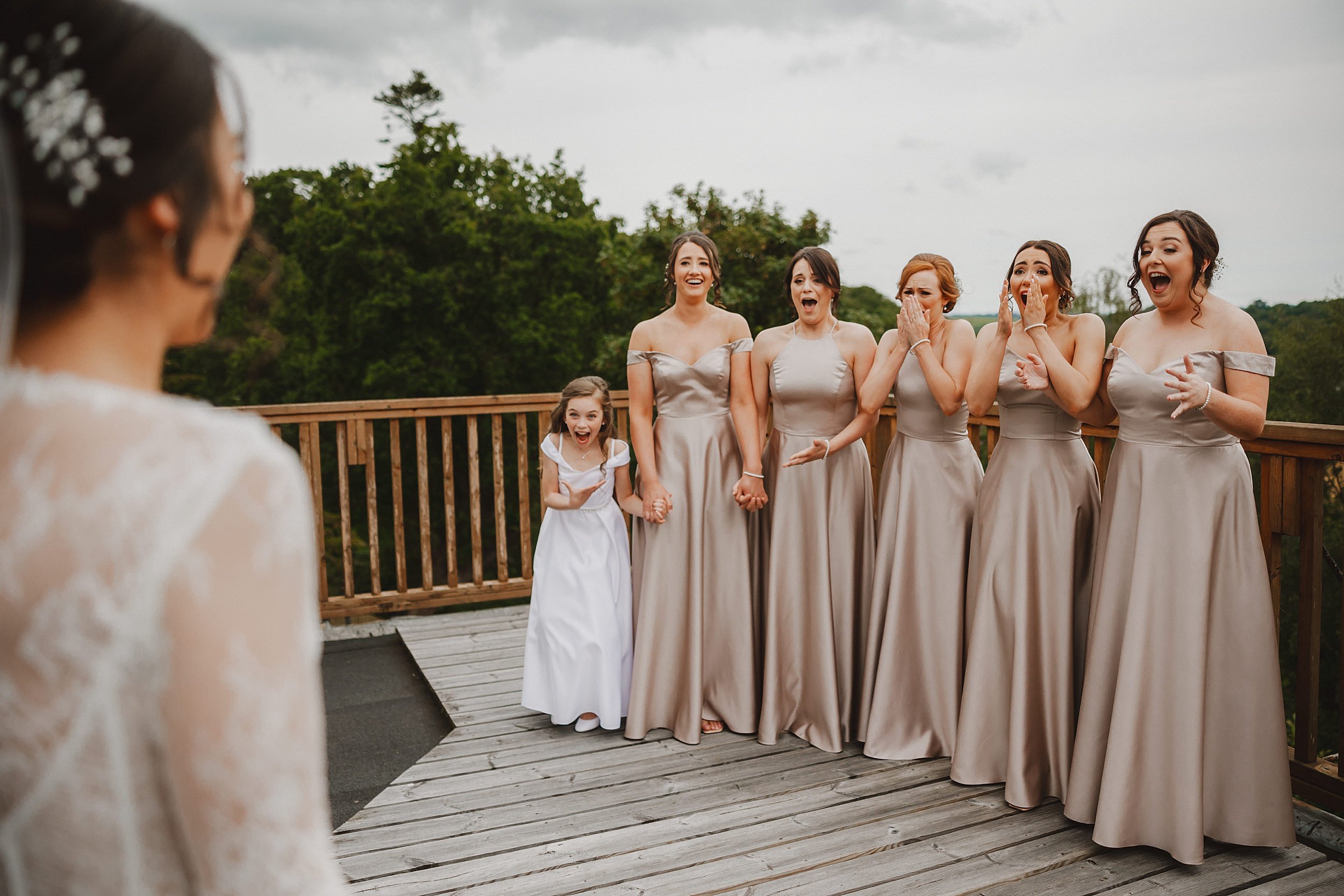 Bridesmaids seeing bride for first time on her wedding day at Enterkine House Hotel