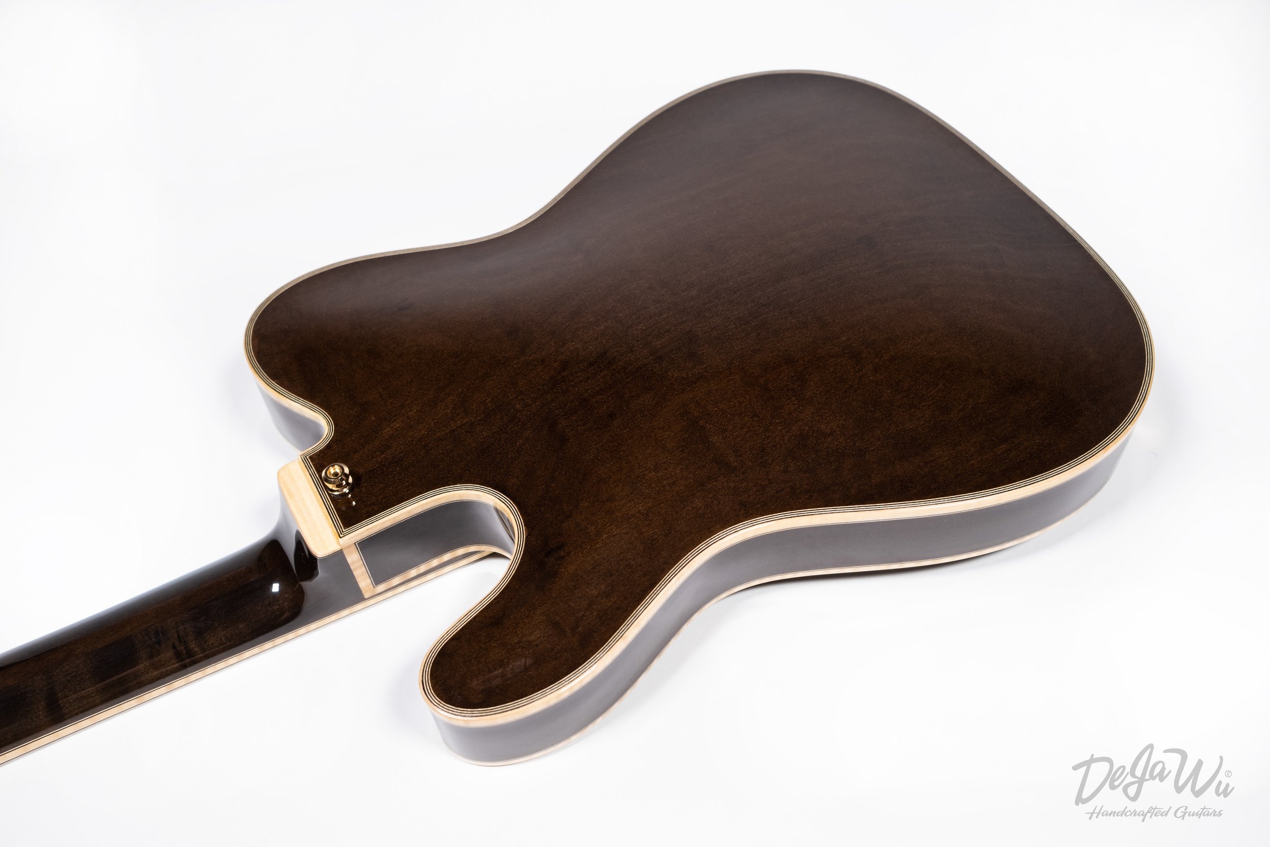 Dejawu Guitars - Hand carved semi hollow guitar from 7500-year-old sinker wood.