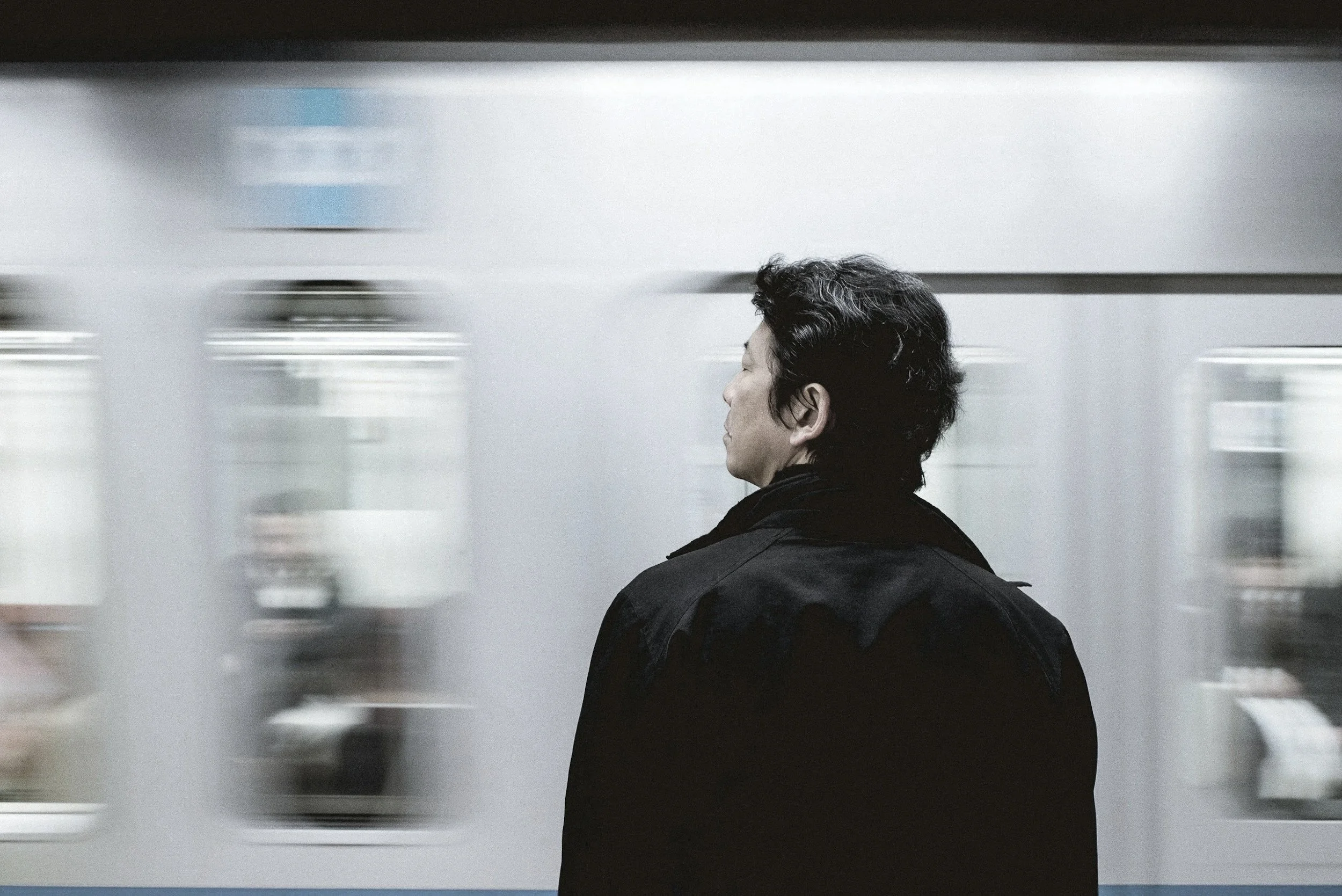 Person disconnected from life as it passes by - the cost of living with OCD