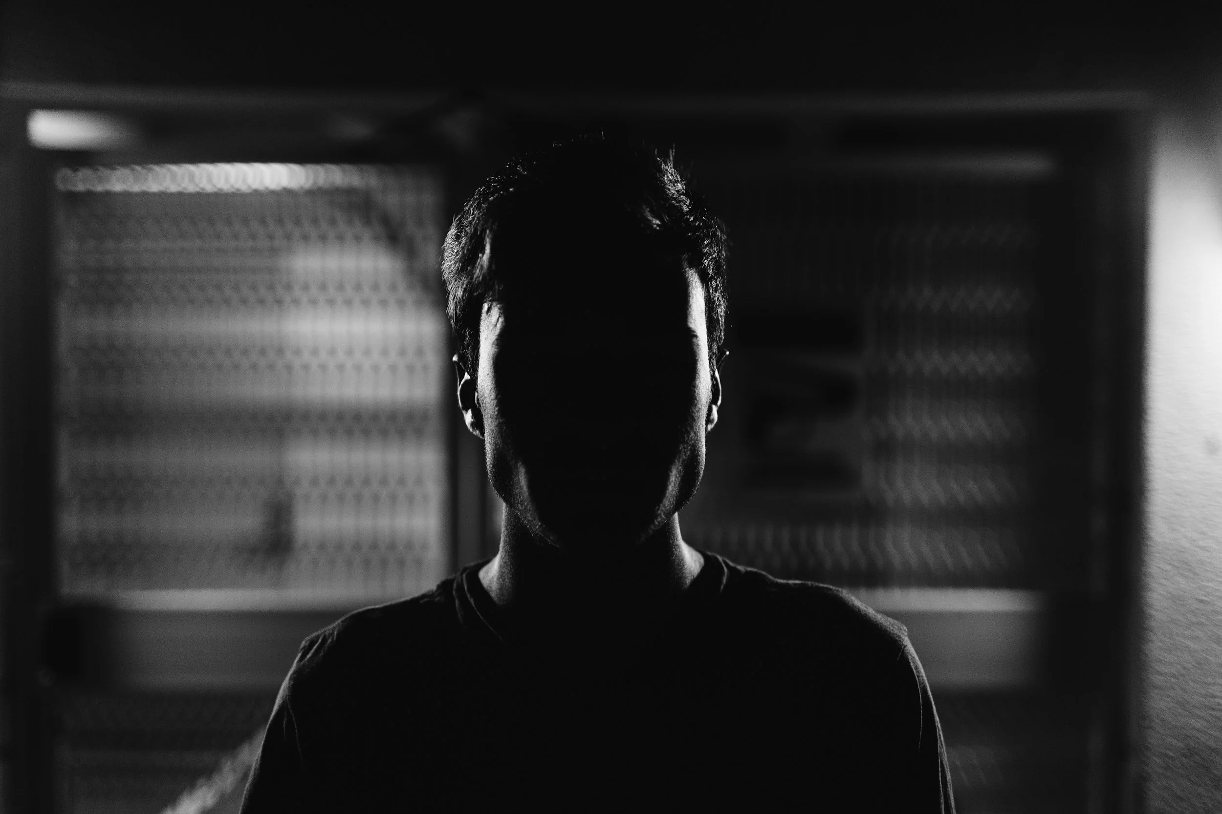 Shadowed figure — OCD intrusive thoughts and shame