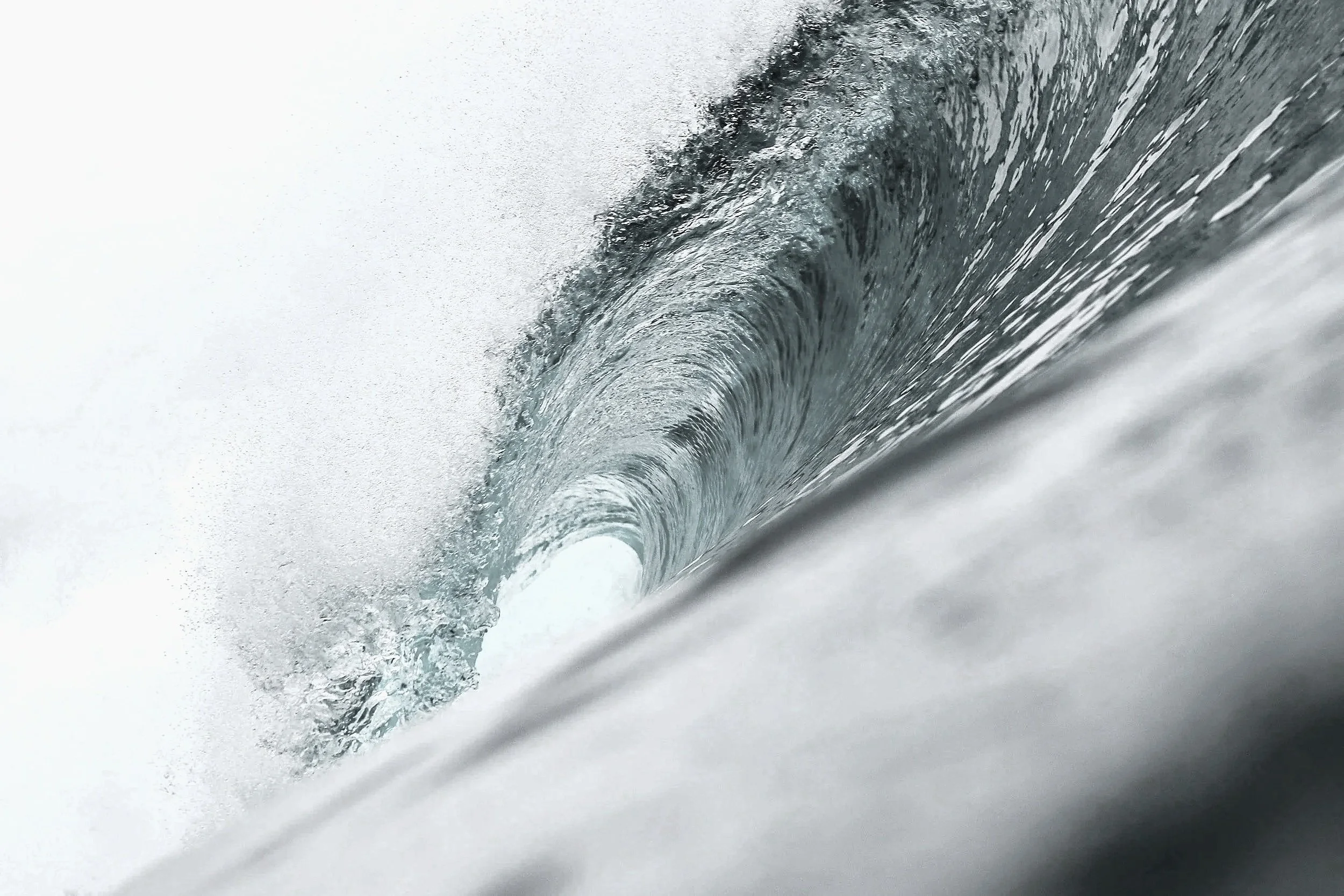 A cresting ocean wave, representing the sudden flood of emotion in a flashback