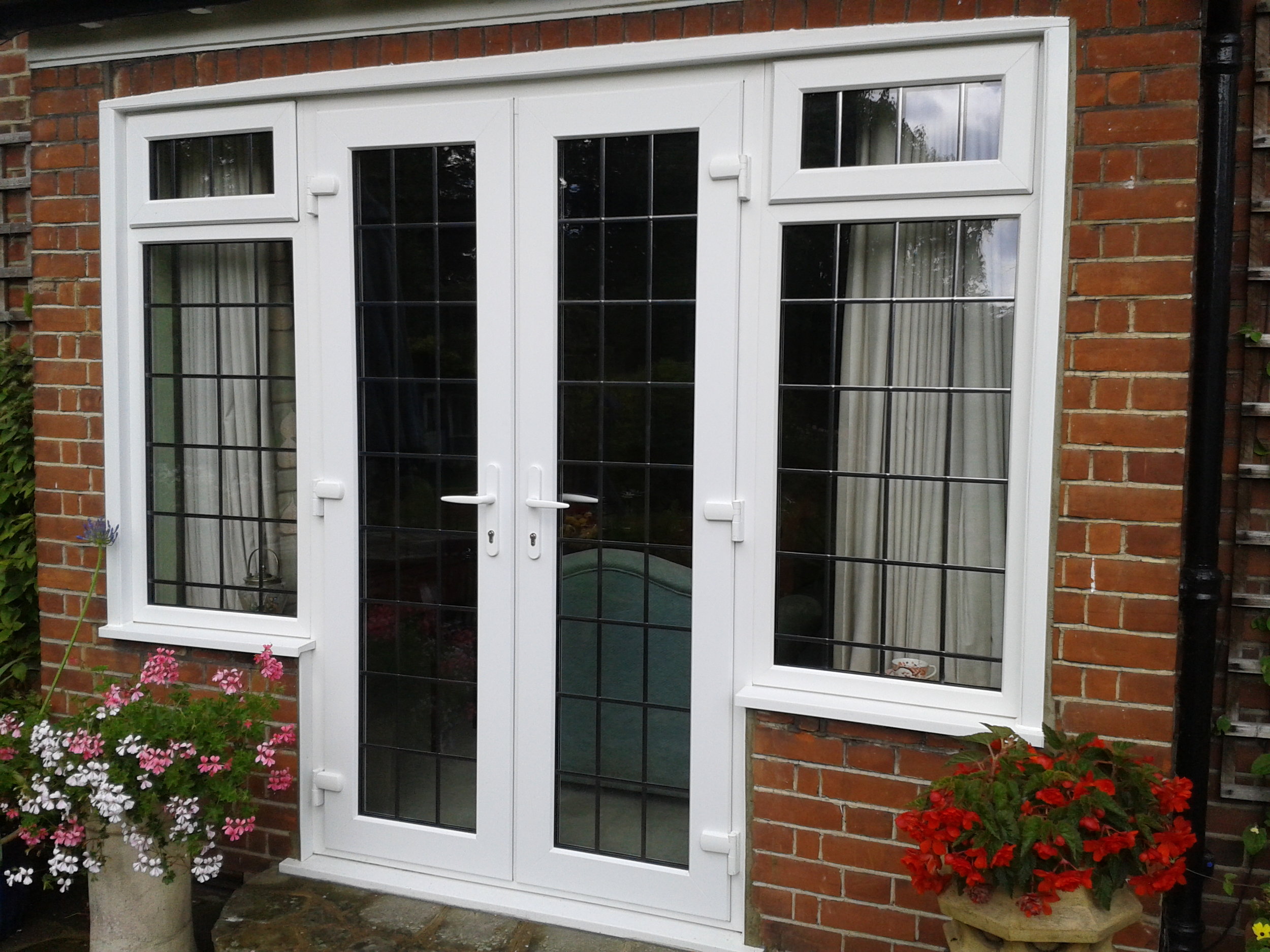 French doors with side windows that open
