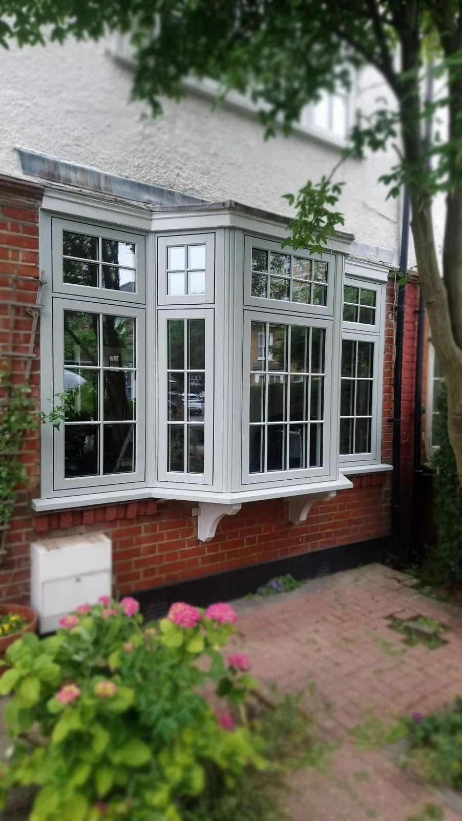 oakwood-bay-window-upvc-garden-exterior.jpg