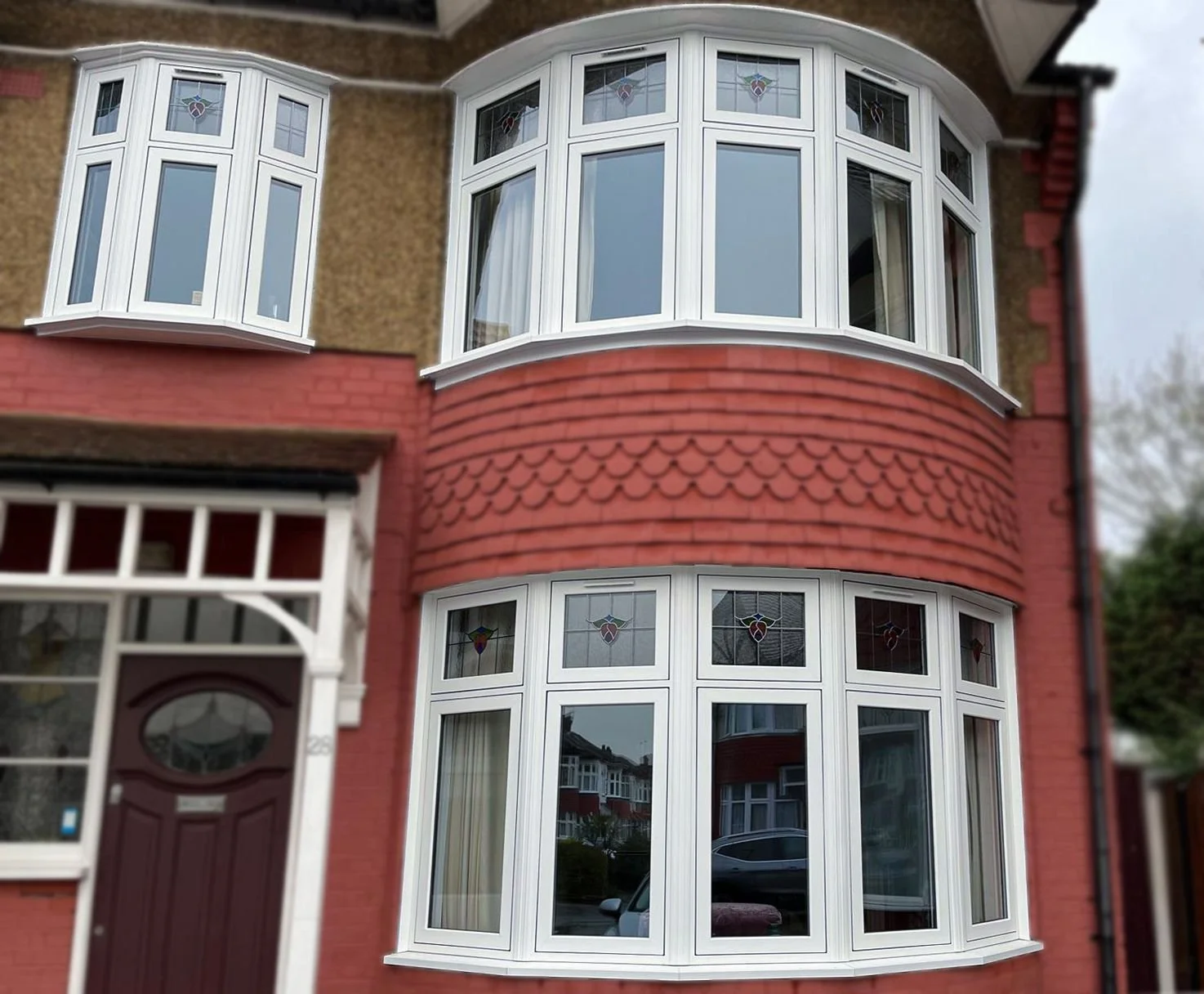 oakwood-bay-window-upvc-red-brick-exterior.jpg