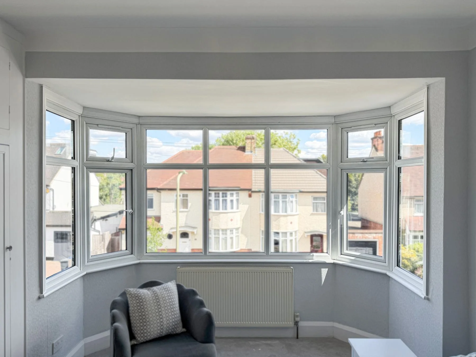 Bay windows inside and out: replacing the front room window on a North London home