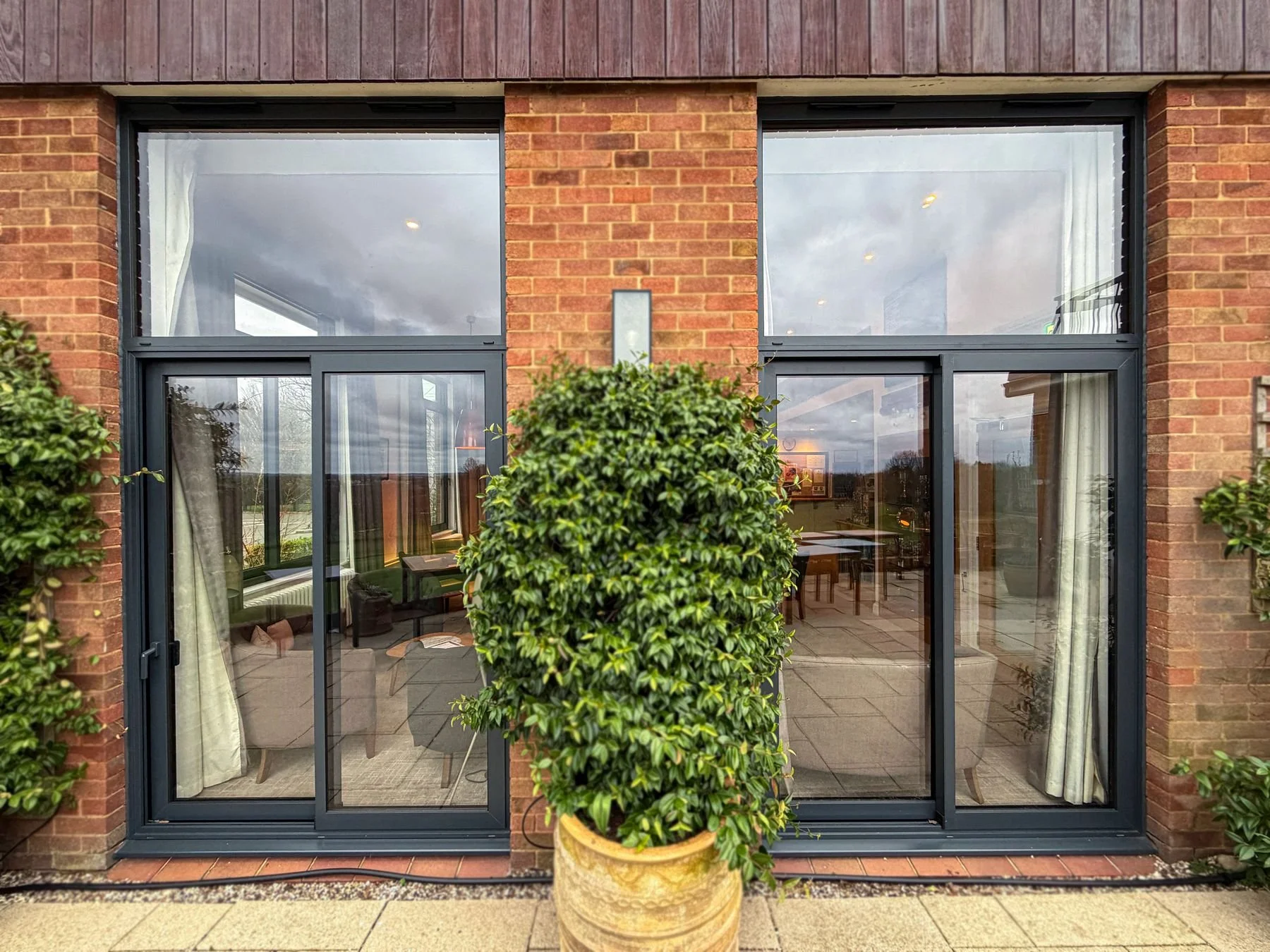 Anthracite grey aluminium sliding patio doors installed by Oakwood Windows