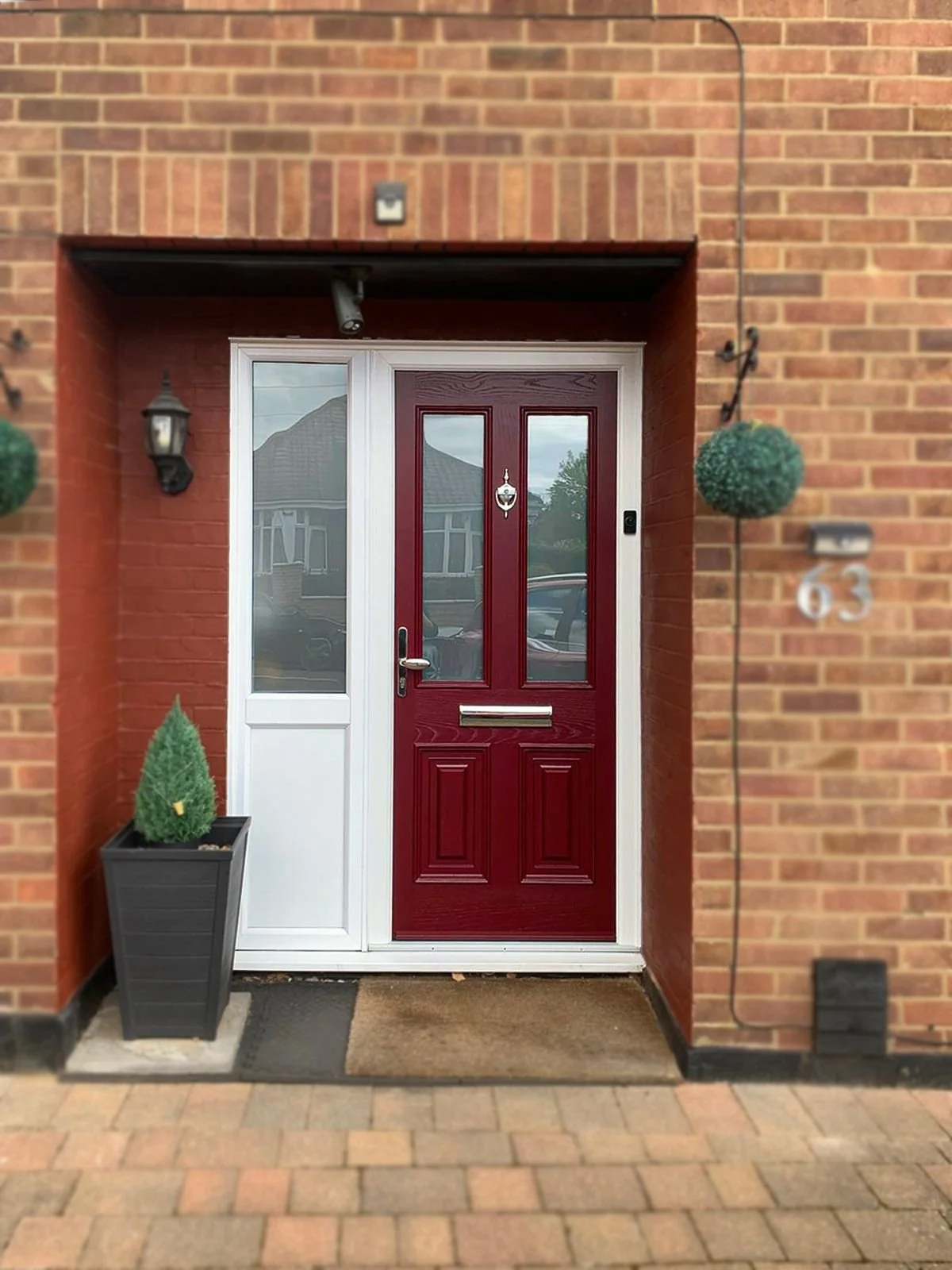 Doors: red composite front door installed in North London