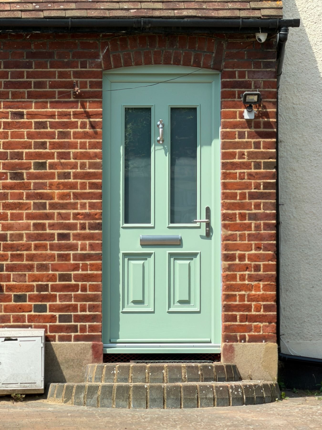 Green cottage style composite front door fitted by Oakwood Windows, North London