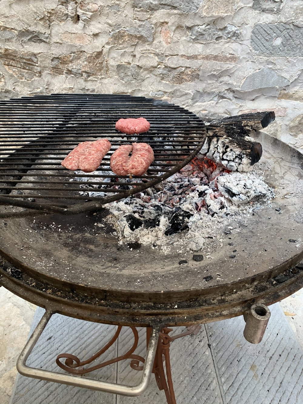 Hamburgers and Sausages on the outdoor grill