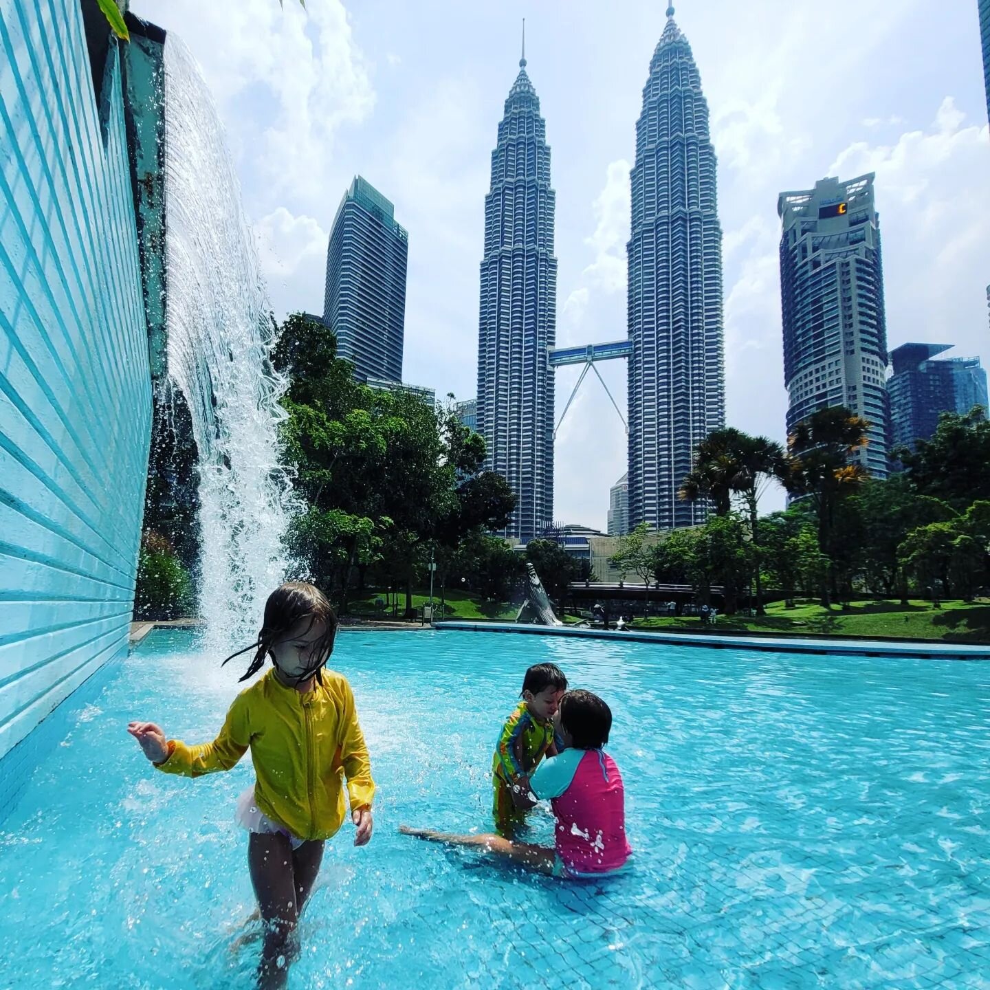 I am back and we had a blast in Malaysia! Here are some highlights of our trip.
Pics in order: Swimming by the famous Petronas Twin Towers, eating roti canai at a local mamak, spending time with my parents, visiting the dinosaur exhibit at the Nation