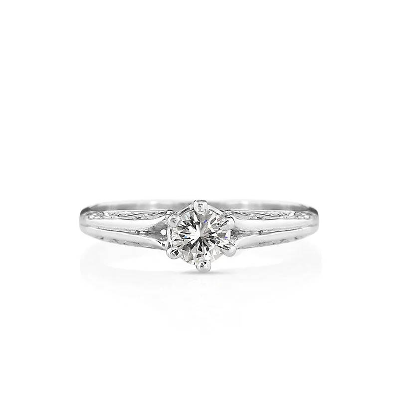 Modern Filigree .50 Carat Diamond Platinum Solitaire