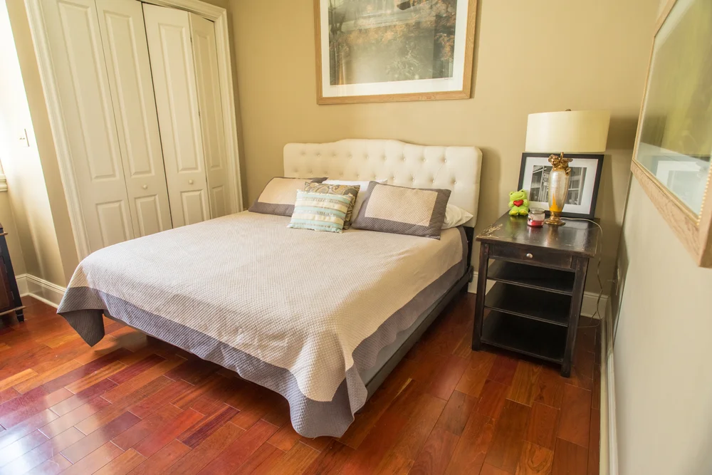 Bedroom with a bed and side table