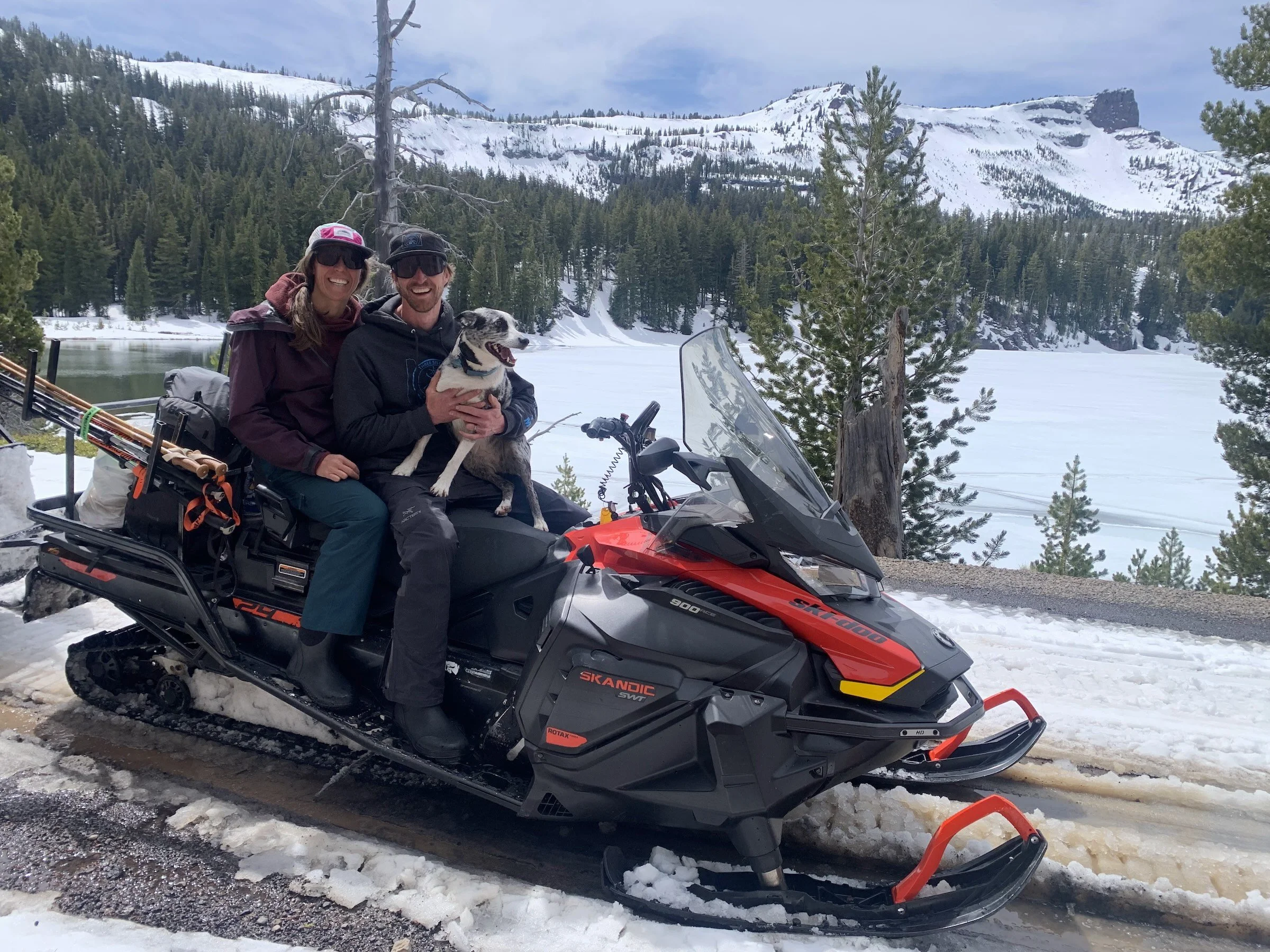 Photo of Owner, Syver Pearson on a snowmobile in the snowy forest