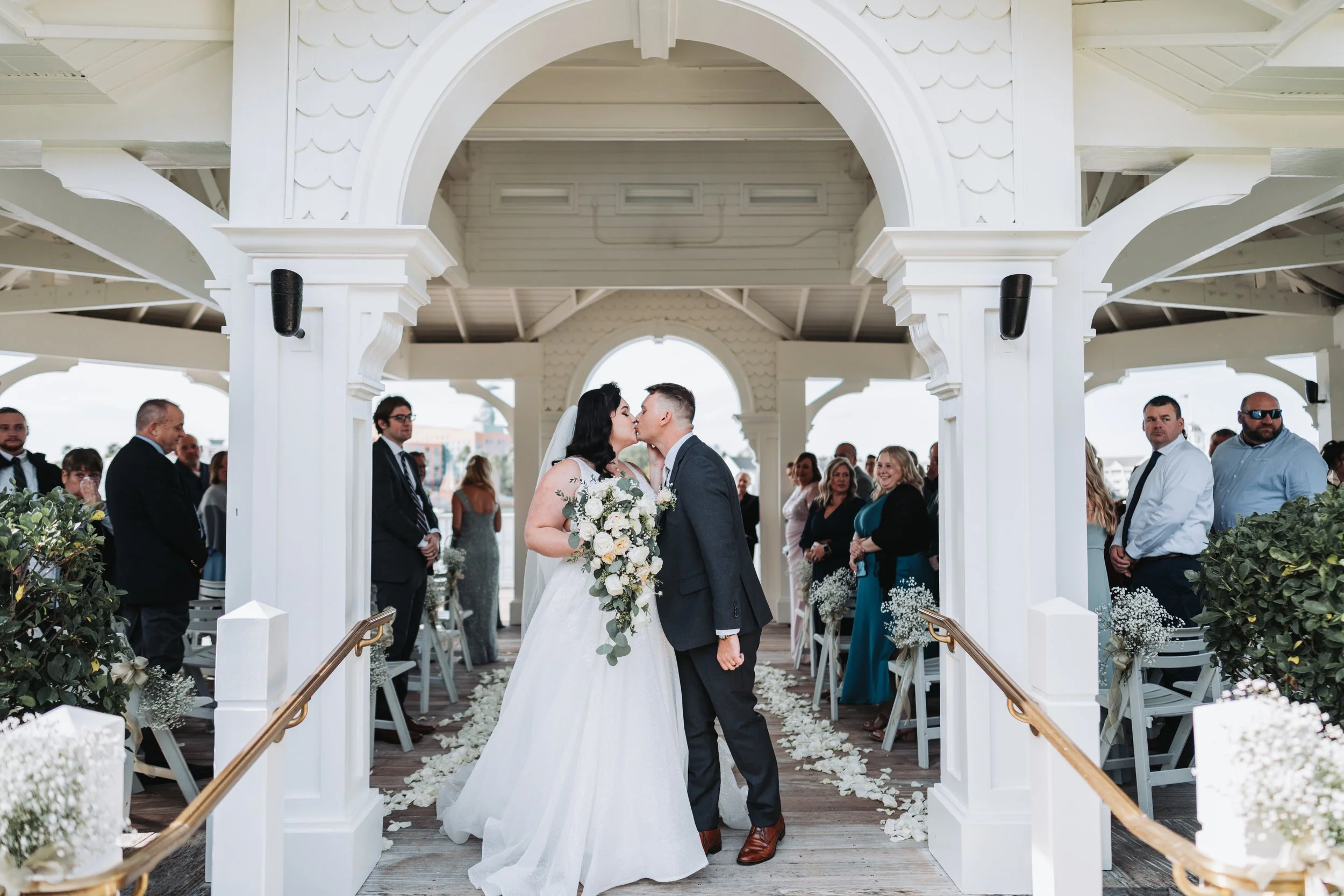 Wedding ceremony at Sea Breeze Point gazebo at Disney's Boardwalk Resort in December.