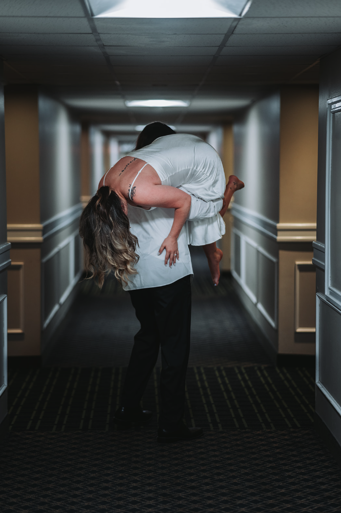 carrying-fiance-hotel-room.png