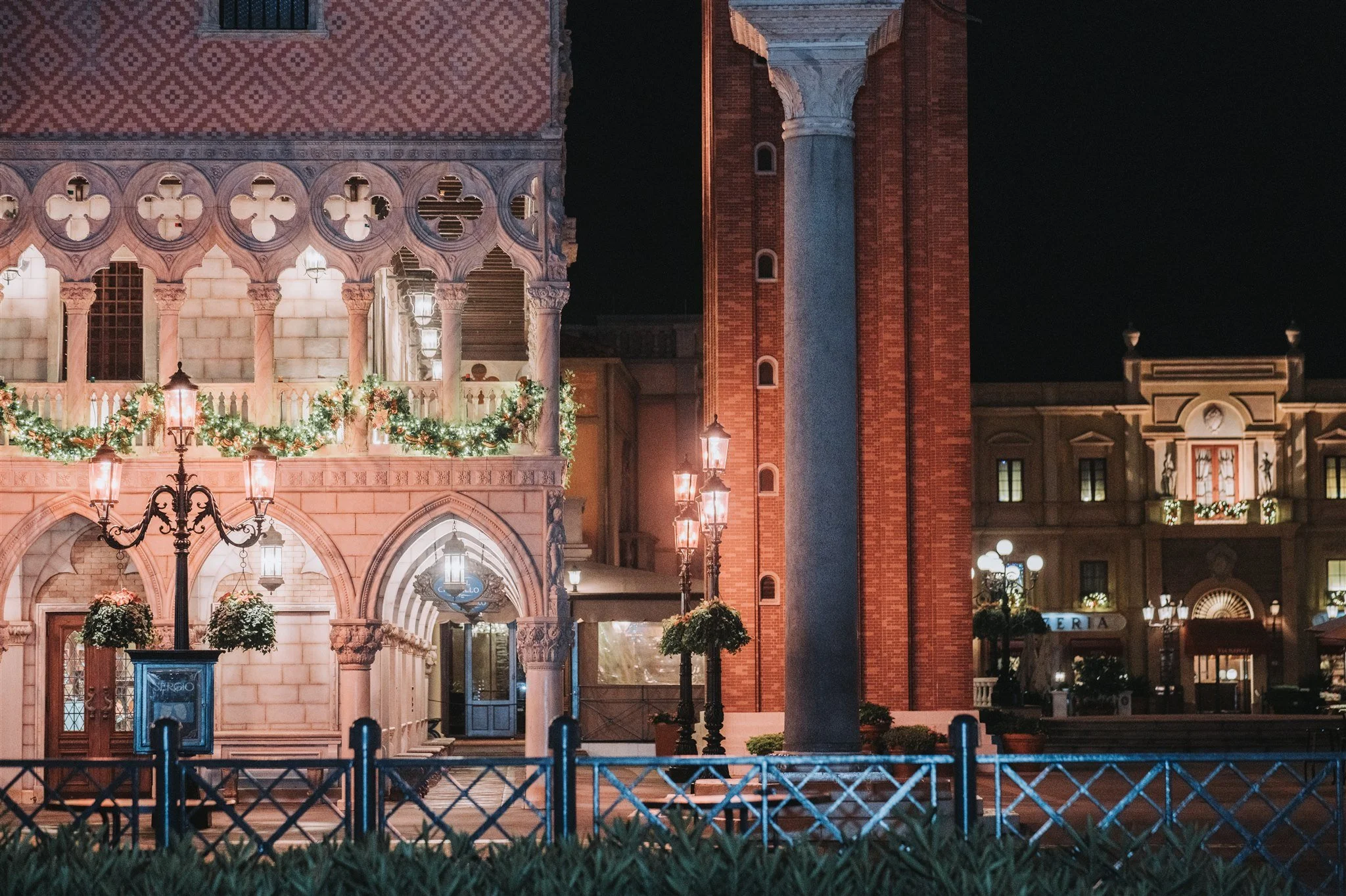 Disney wedding photography team capturing EPCOT Italy Isola wedding.