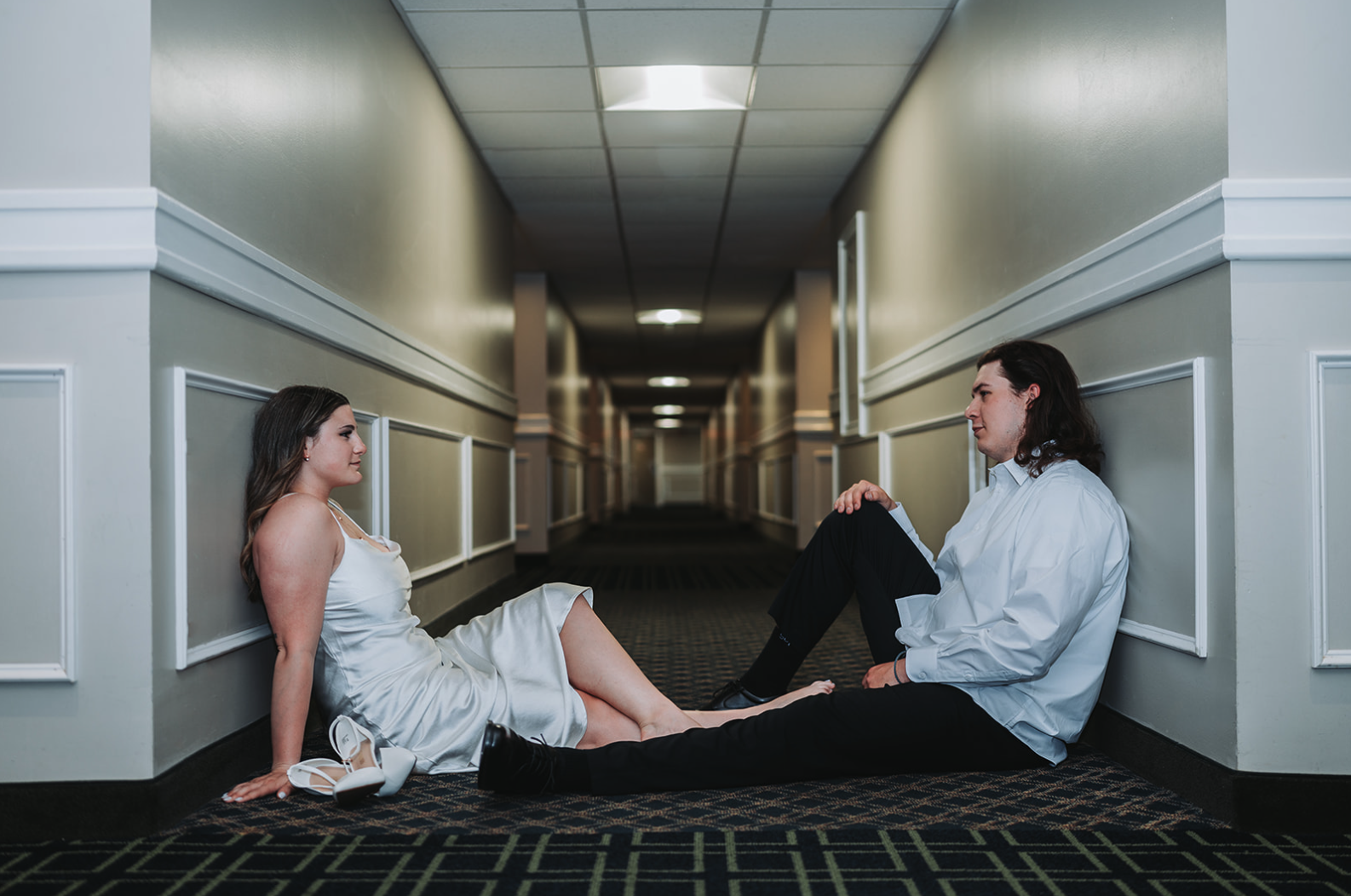 hotel-hallway-couple.png