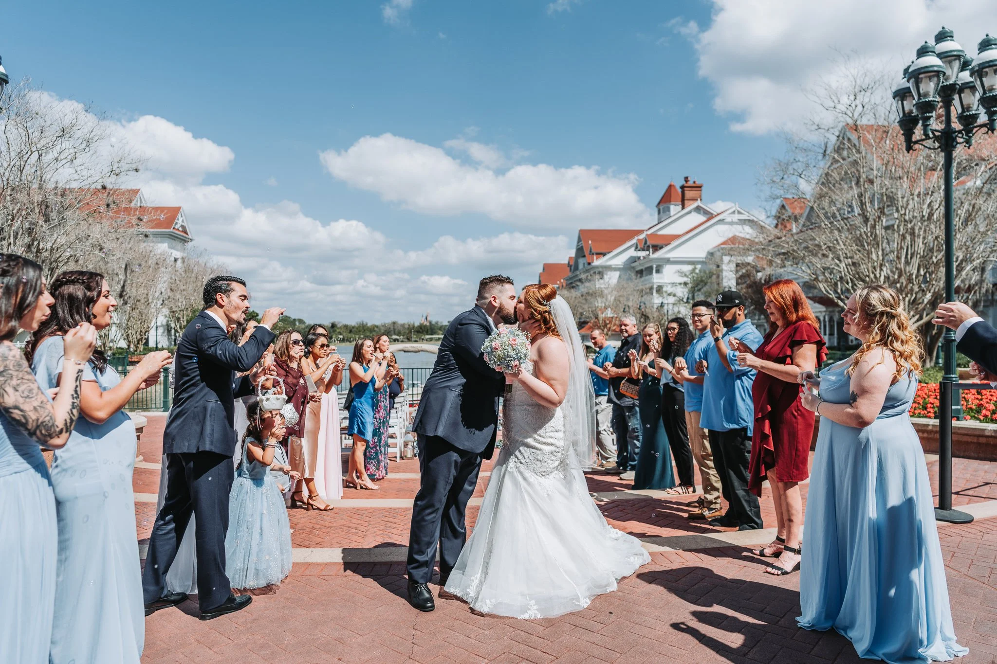 Husband and wife photo team captured perfect wedding photos at Walt Disney World with professionalism and a calming presence—would book again!
