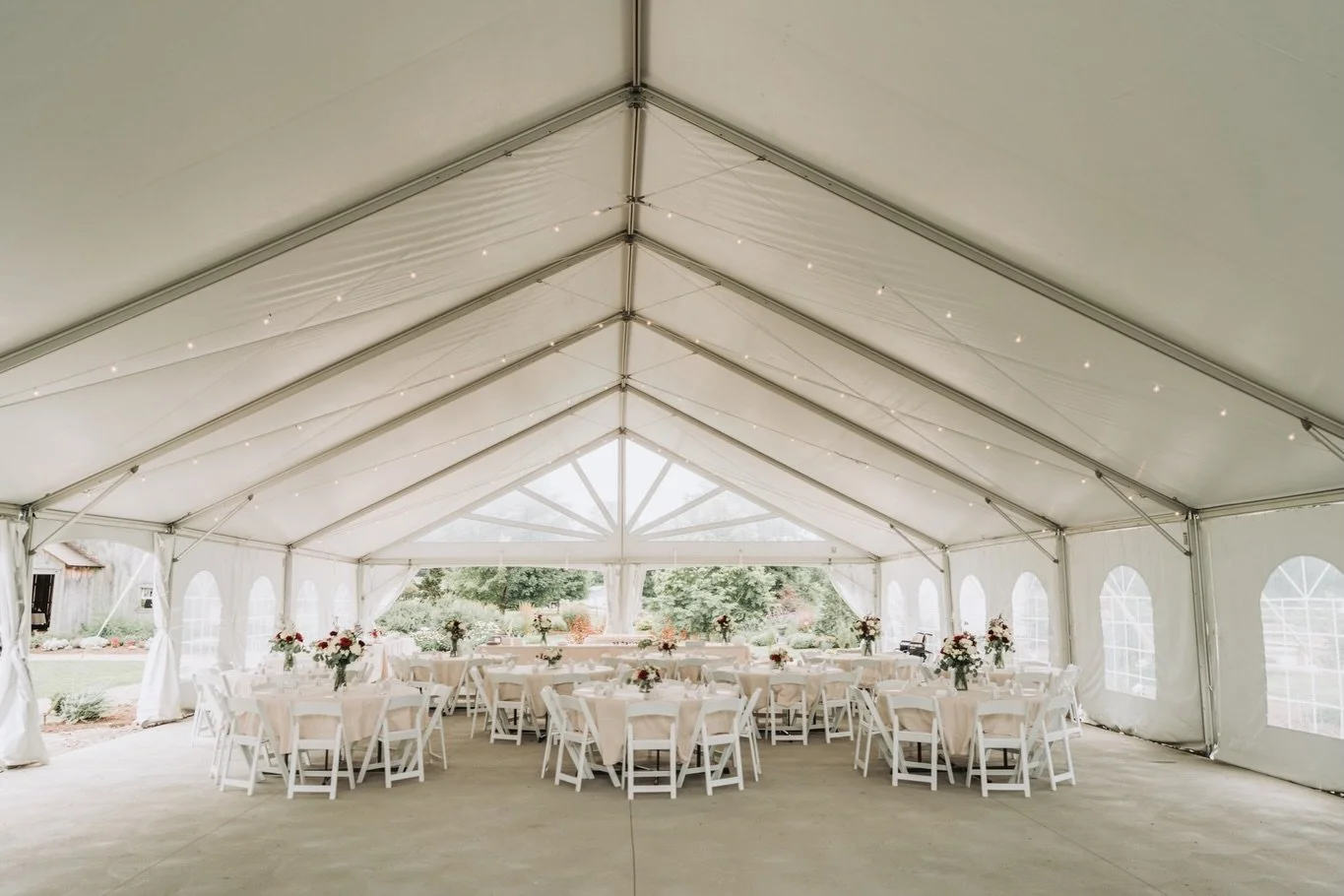 Before the dancing, before the toasts, before the room fills with the people they love most, there&rsquo;s this!

A tent full of garden florals and details that took months to plan. We always photograph the reception space before guests arrive becaus