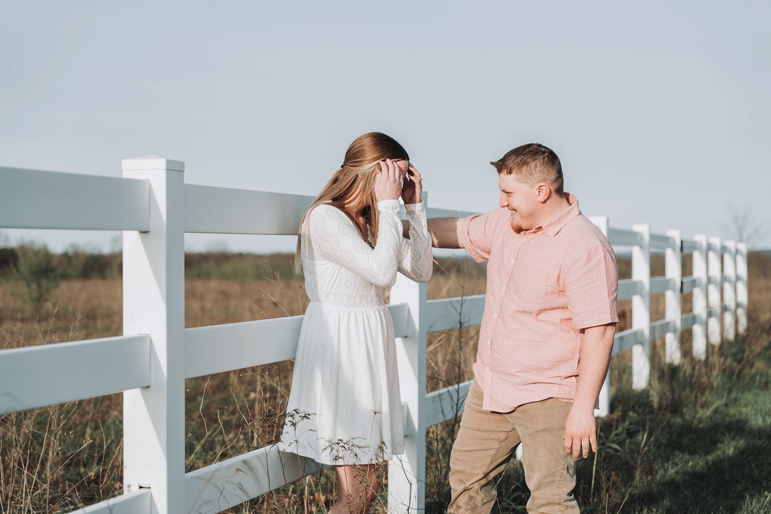 the-view-llc-white-fence-engagement-photo.png