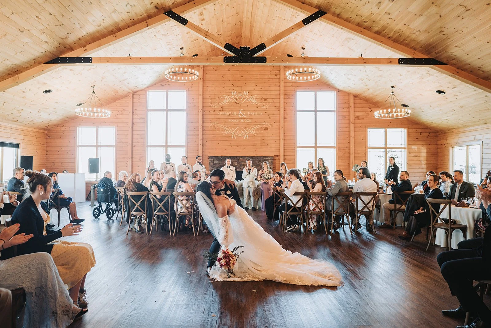 Indoor ceremony at Rolling Rails Lodge for a March wedding.