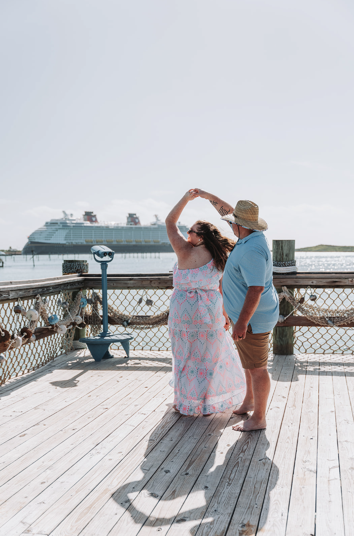Romantic engagement photo session on Disney’s Castaway Cay before a cruise wedding.