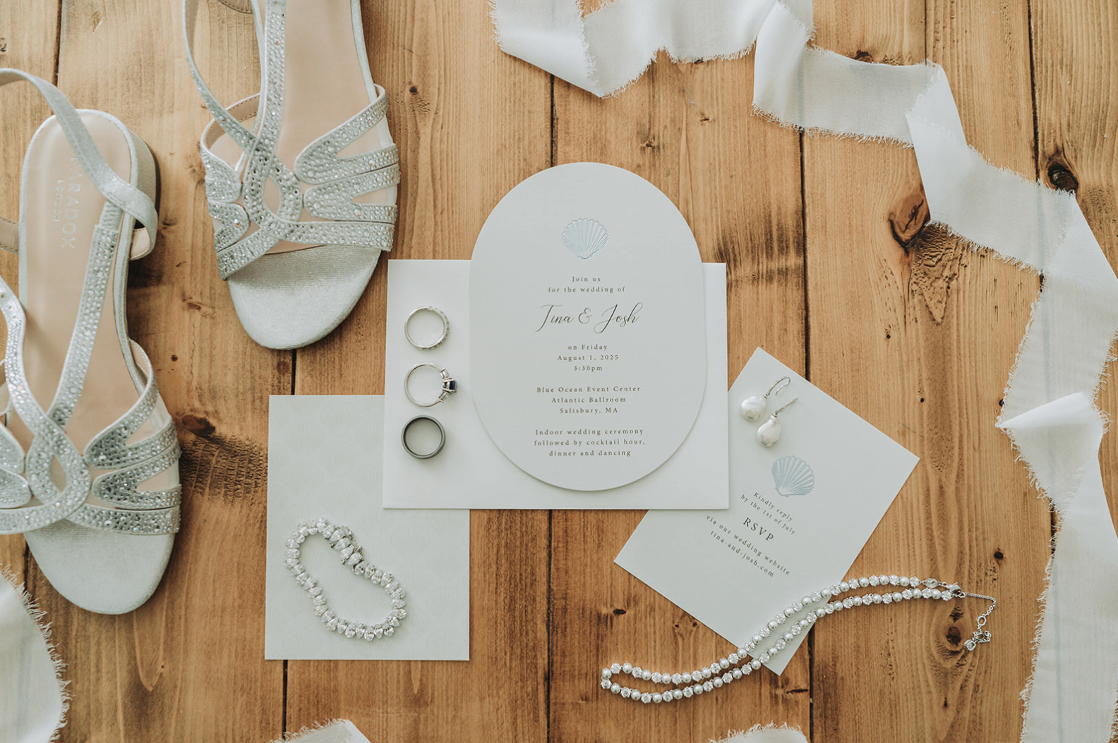 Ocean themed wedding flat lay details.