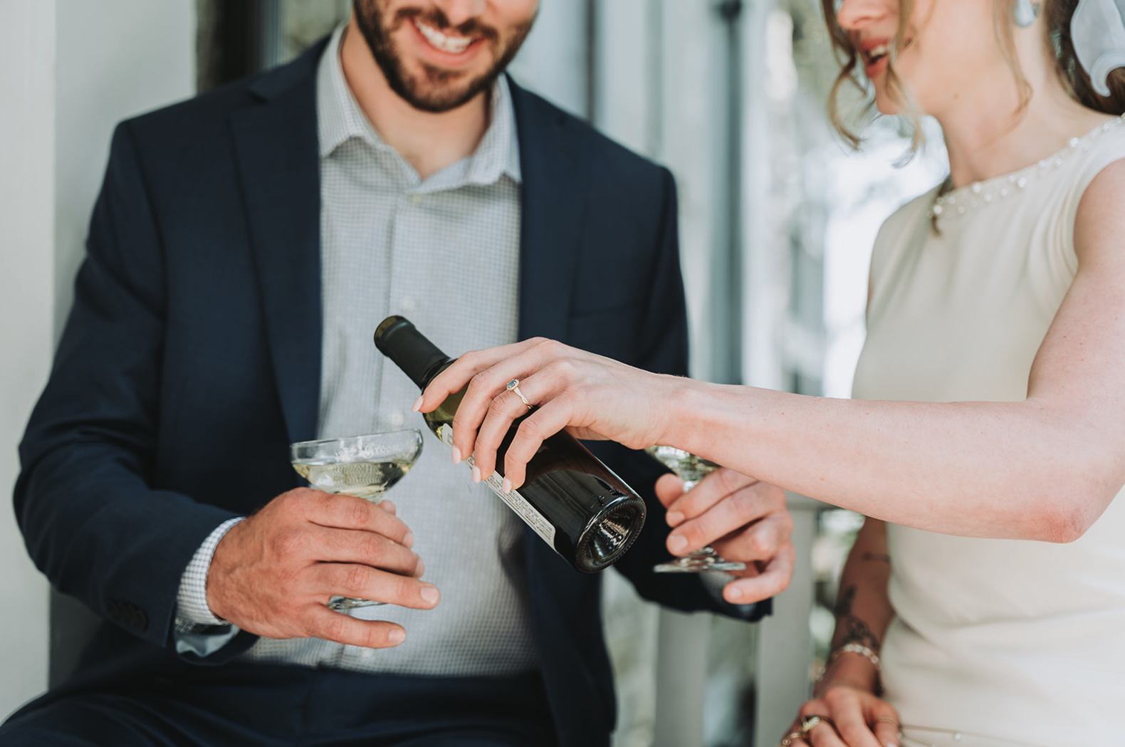engagement-photo-pouring-glass-wine.png