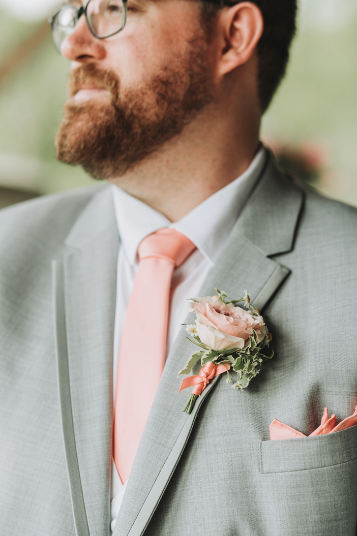 Spring florals for groom boutonniere.
